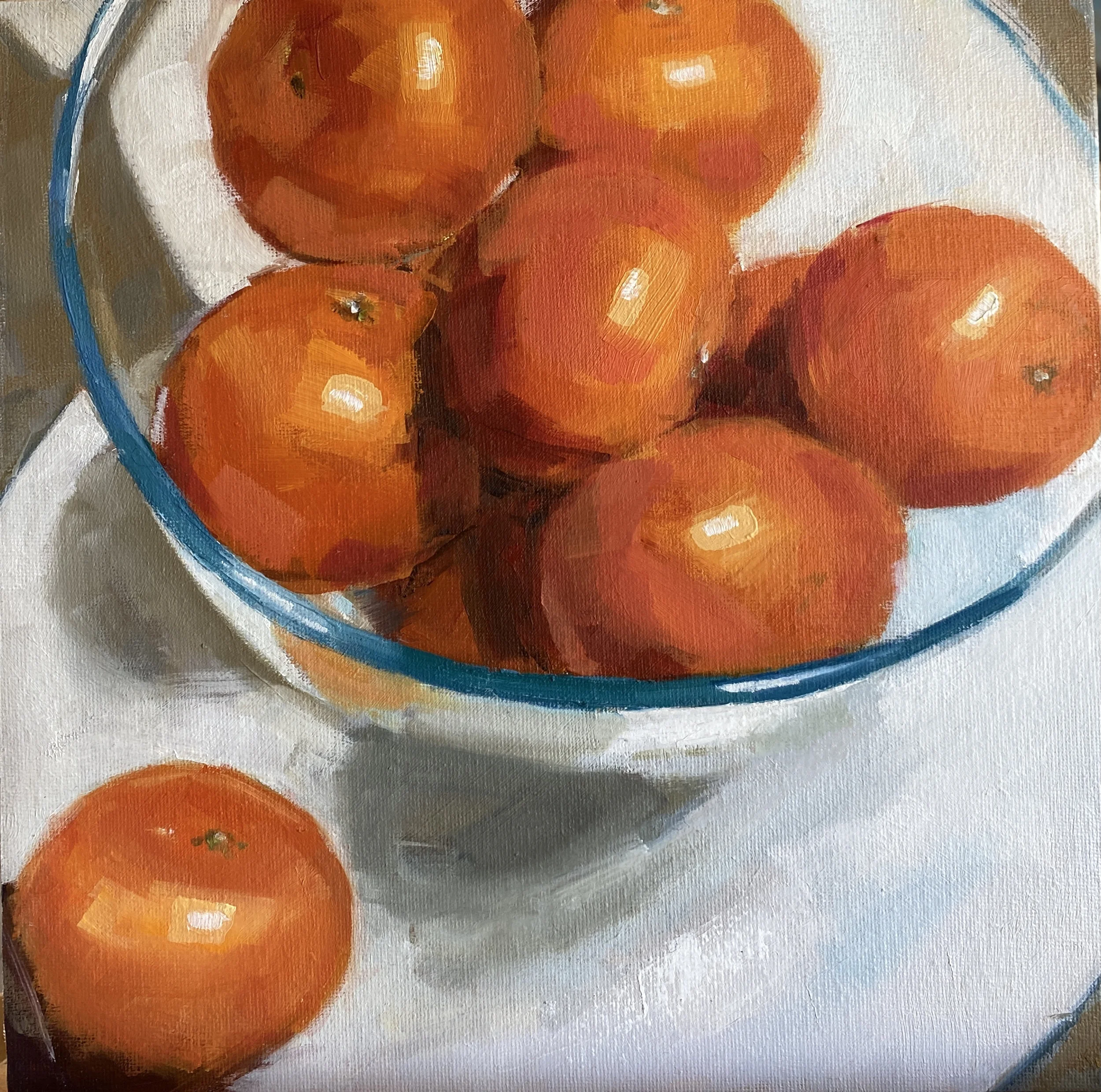 Still life oil painting of bright orange clementines in a clear bowl