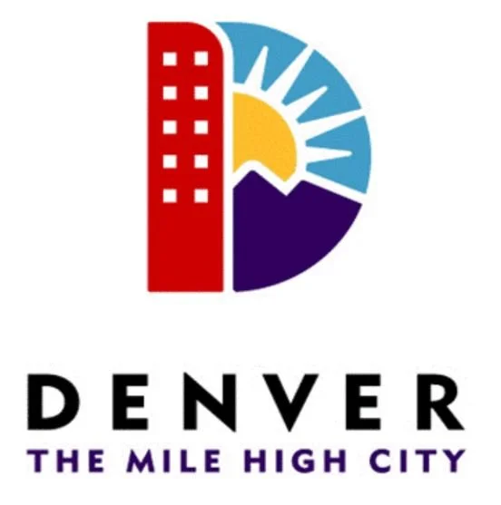 Logo of Denver city featuring a stylized cityscape with a red building and a circular background with a sun and mountain design, with text 'Denver The Mile High City' underneath.