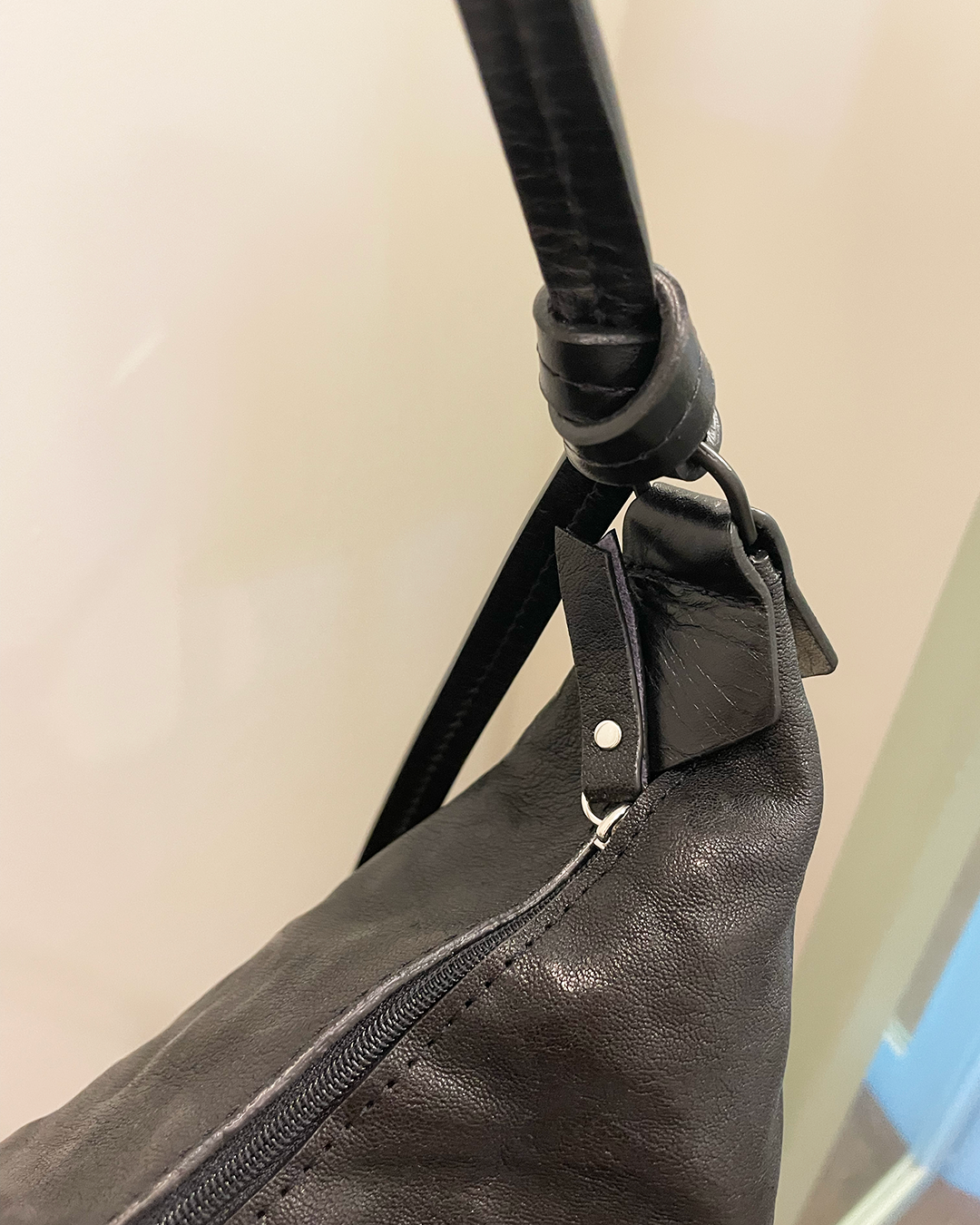 Deborah Kent's Boutique in South Tampa — Basalt Rumpled Sheepskin Zippered  Sling Bag by B. May Bags