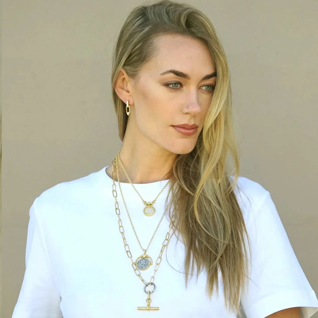 Known for ancient coin jewelry crafted in mixed metals and antique finishes &mdash; pieces with a history you can wear. TAT2 Designs.

New collection, now in store.​​​​​​​​​​​​​​​​