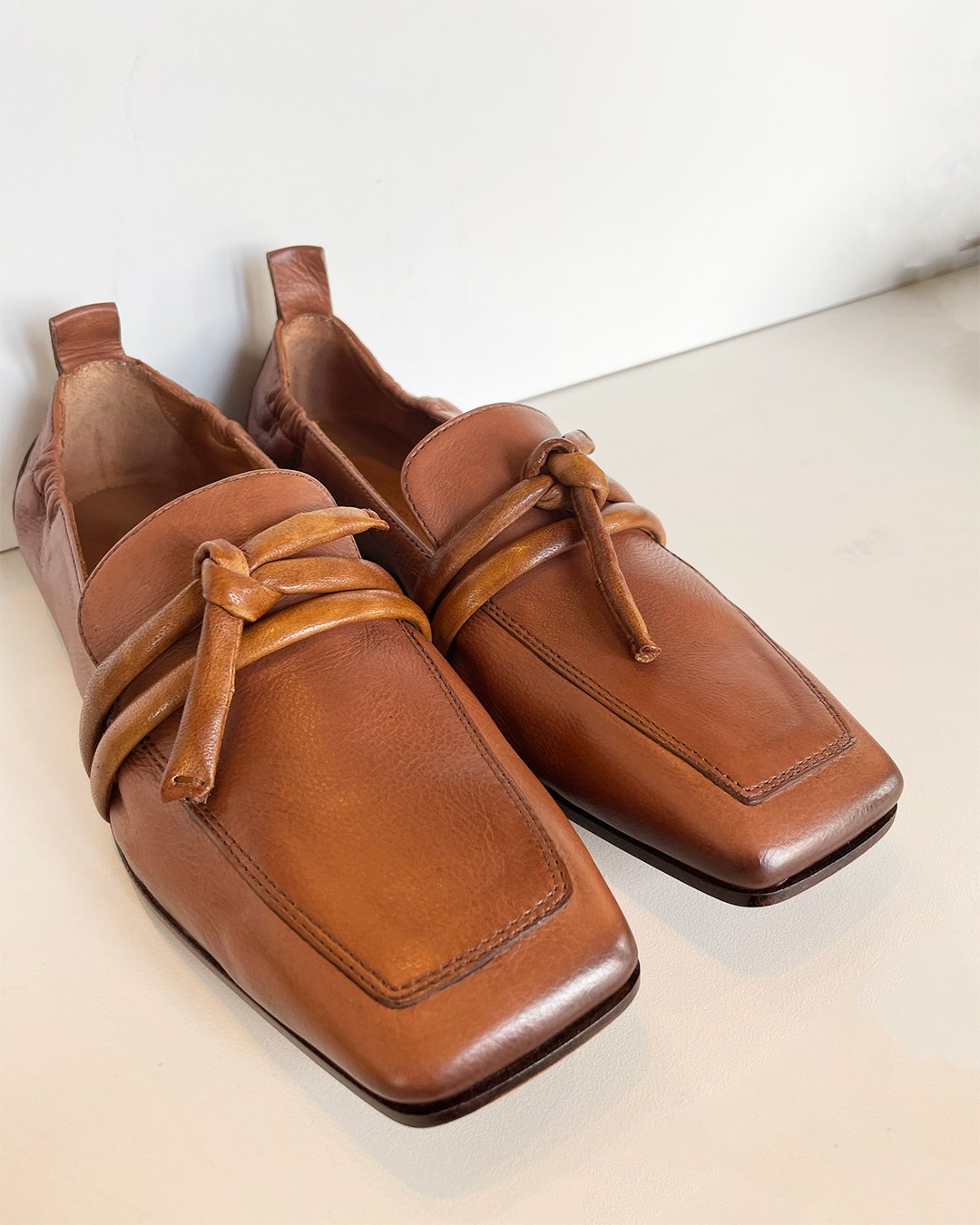 Leather Loafer with Tie Detail in Cognac by INK Shoes at Deborah Kent's Boutique in South Tampa