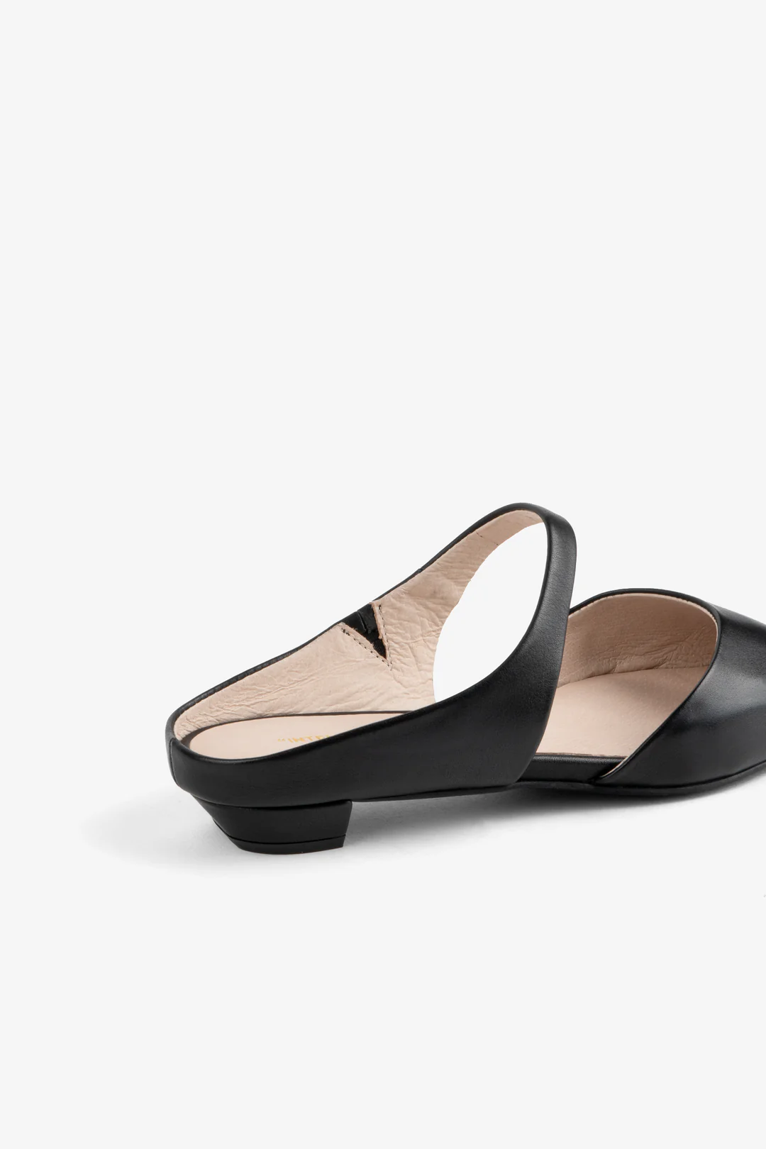 Lourdes Slip-on Mule in Black by Intentionally Blank at Deborah Kent’s Boutique in South Tampa