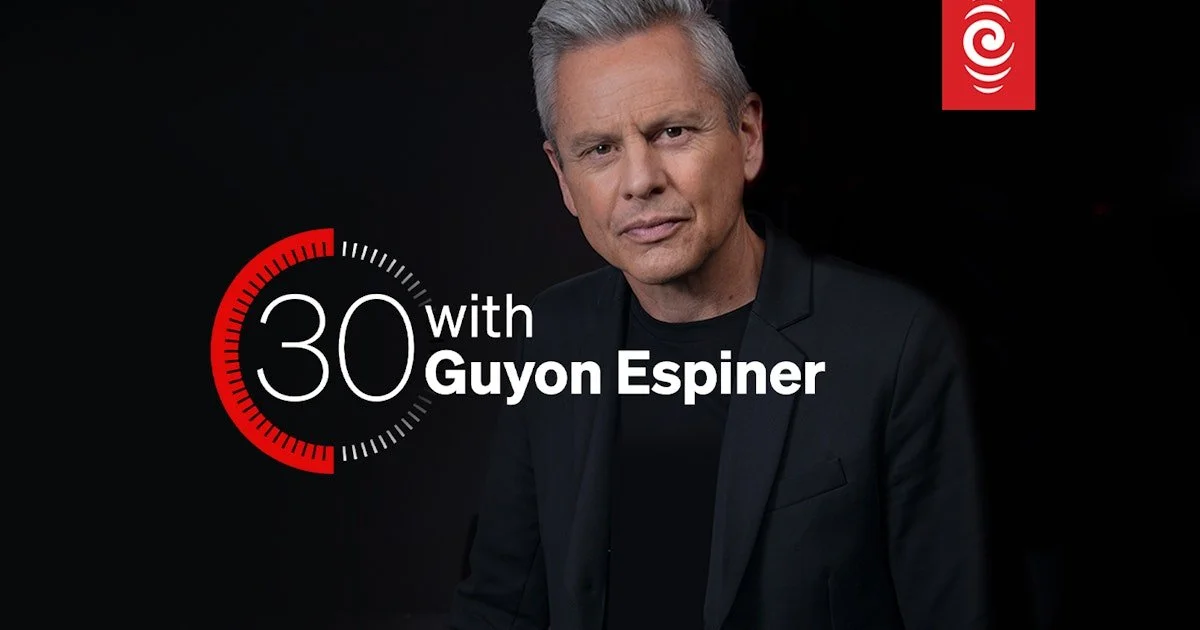 Portrait of Guyon Espiner in a black blazer against a dark background, with a graphic that reads '30 with Guyon Espiner' and red and white branding in the top right corner.