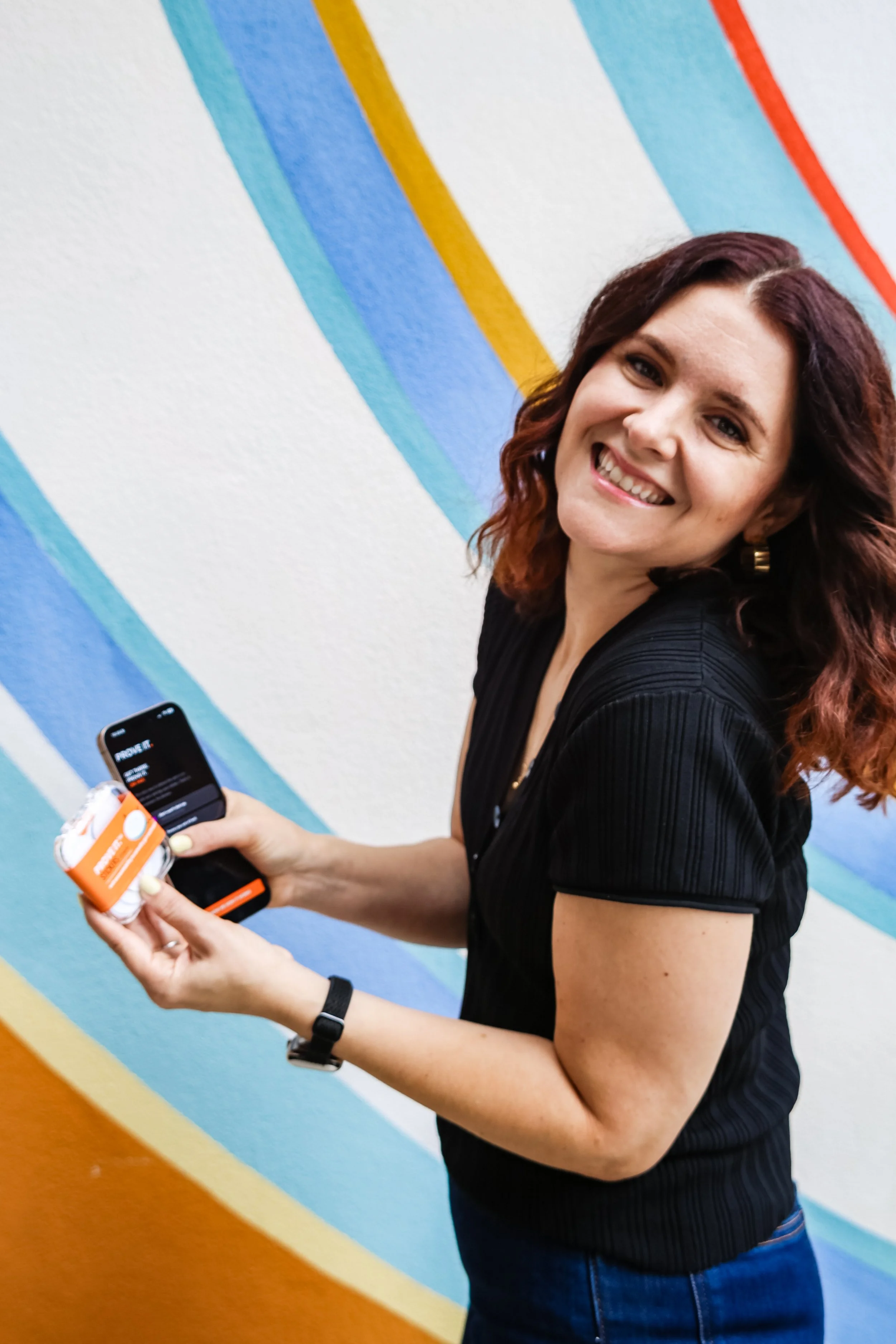 cofounder-holding-phone-and-case-PROVEIT.jpg