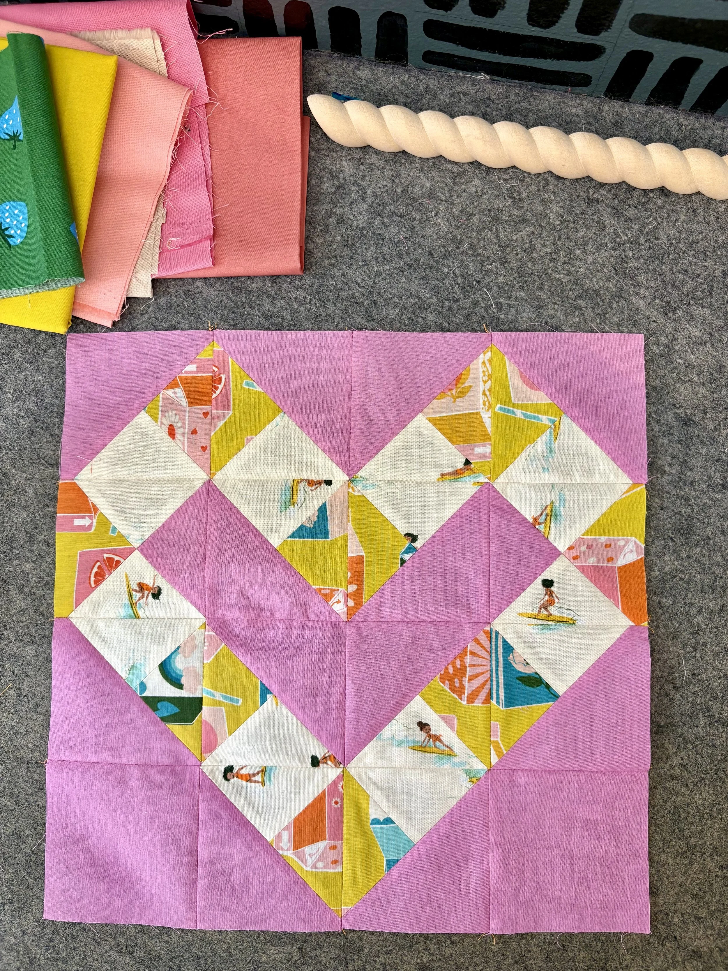 A pink patchwork quilt block Mija Handmade