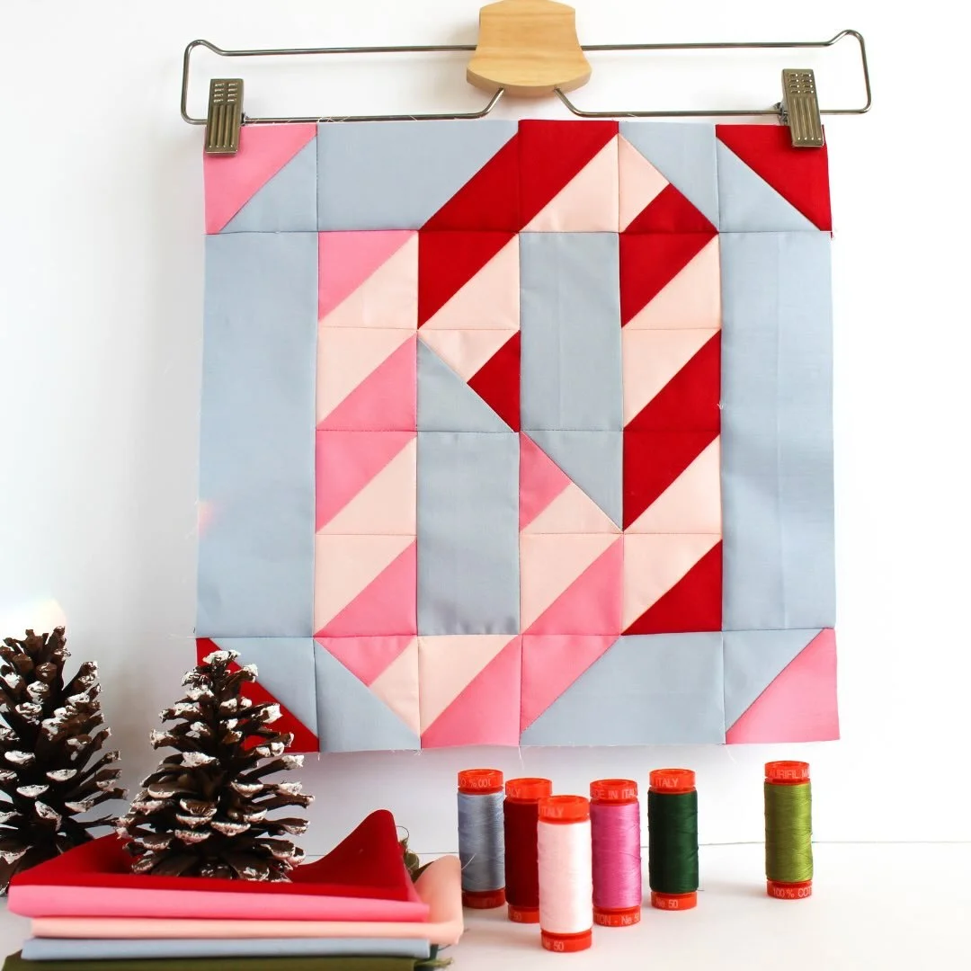 On the fifth day of the Quiltmas Spectacular, Joshua from @liftingandstitching brings us the Dance of the Candy Canes 🩰🍭🍬❄️. 

I love the sweet pink candy canes in this version from @shannonfraserdesigns - I always liked the candy canes of untradi