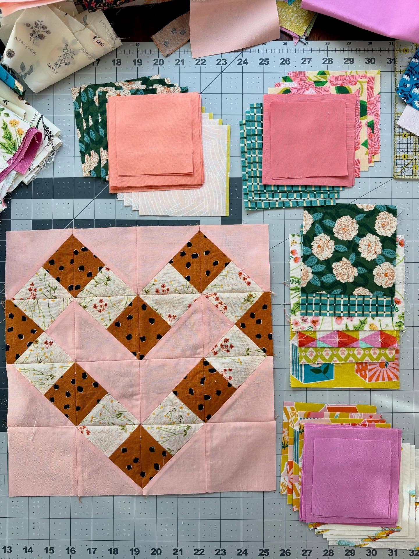 Having fun mixing and matching. 

While testing my next block pattern, I decided I&rsquo;d make enough blocks for a baby quilt. My vision is scrappy happy. Each block will have a different pink background and show off different prints in the heart pa