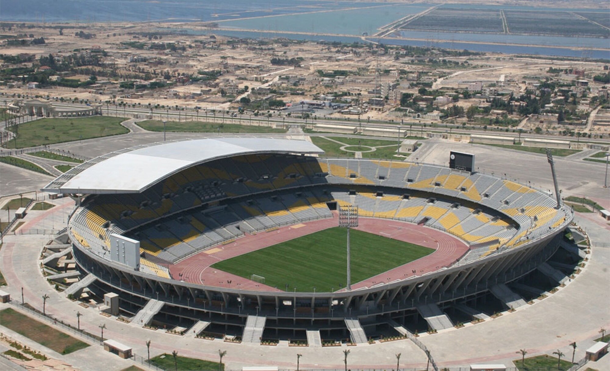 Стадионы 1 8. Борг Эль араб стадион. Египет Александрия стадион. Стадион Аль Мухаррак. Национальный стадион (Лагос).