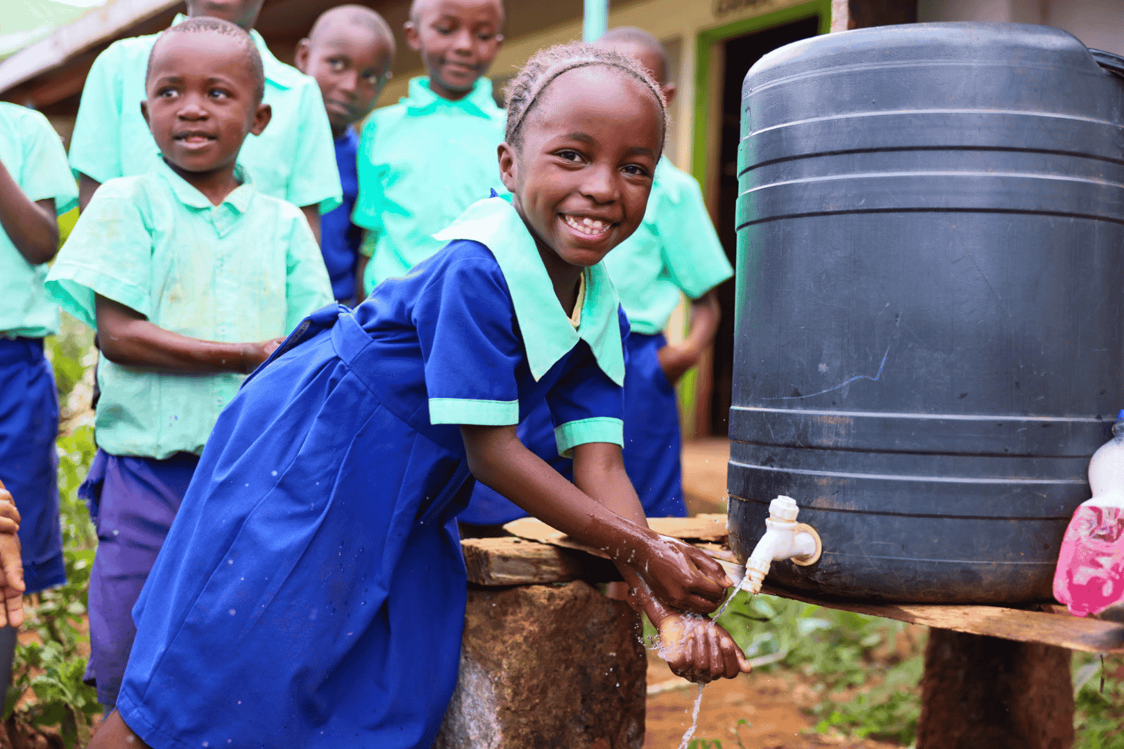 Kids at water tank