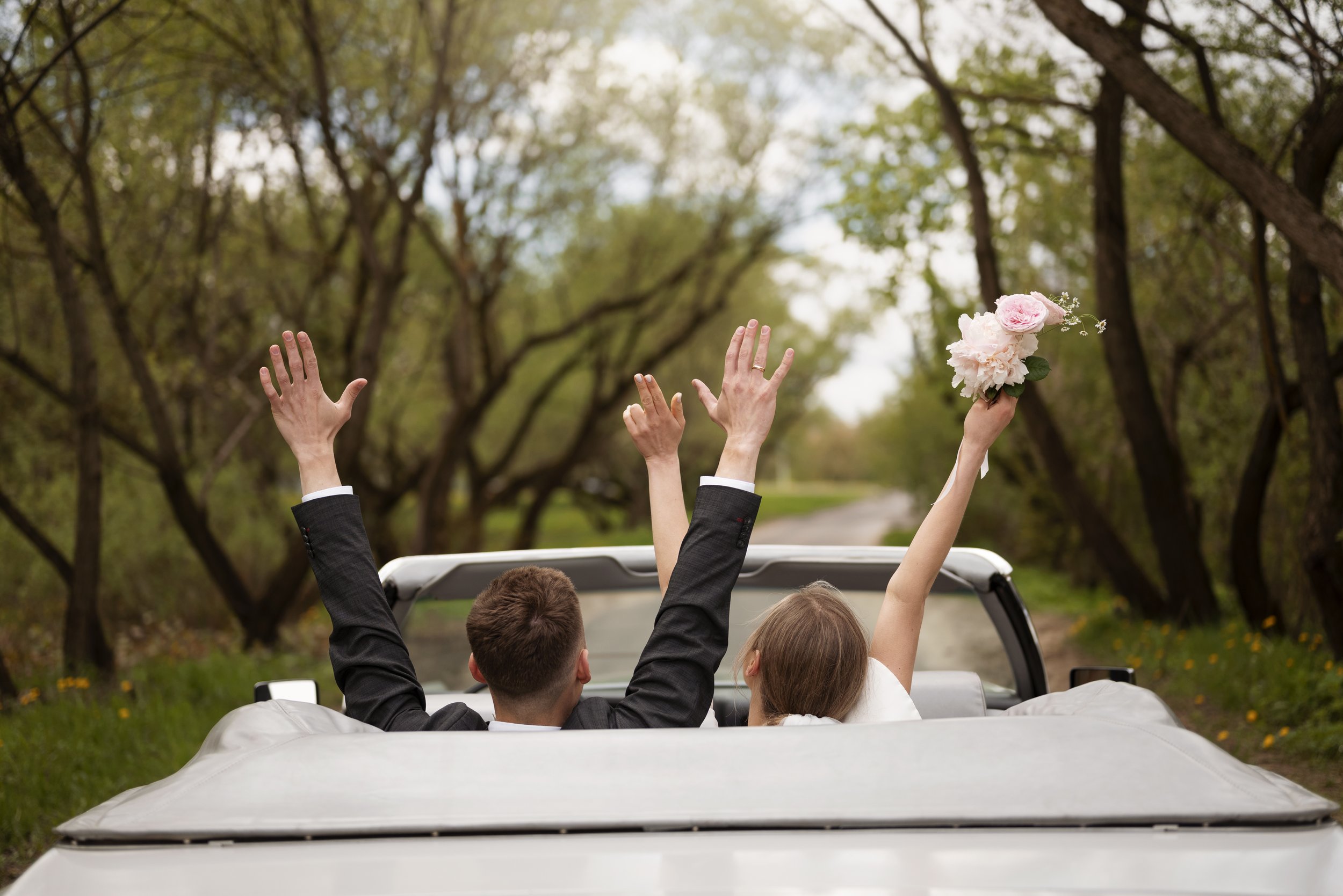 just-married-couple-with-their-car.jpg