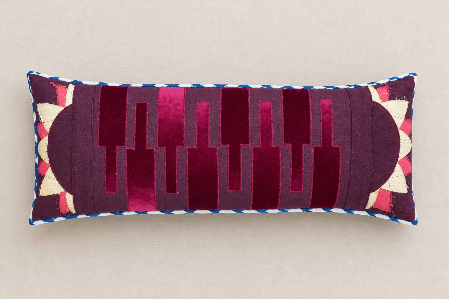 Sun dial velvet bolster.jpg