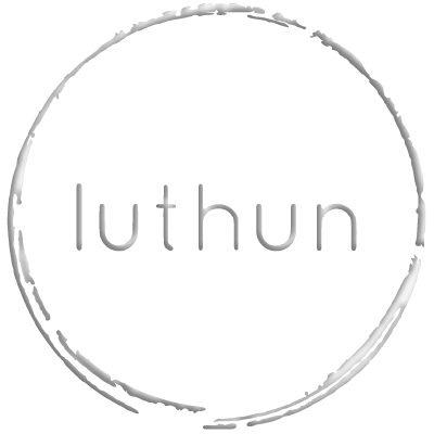 The word 'luthun' inside a circular rough sketch on a black background.