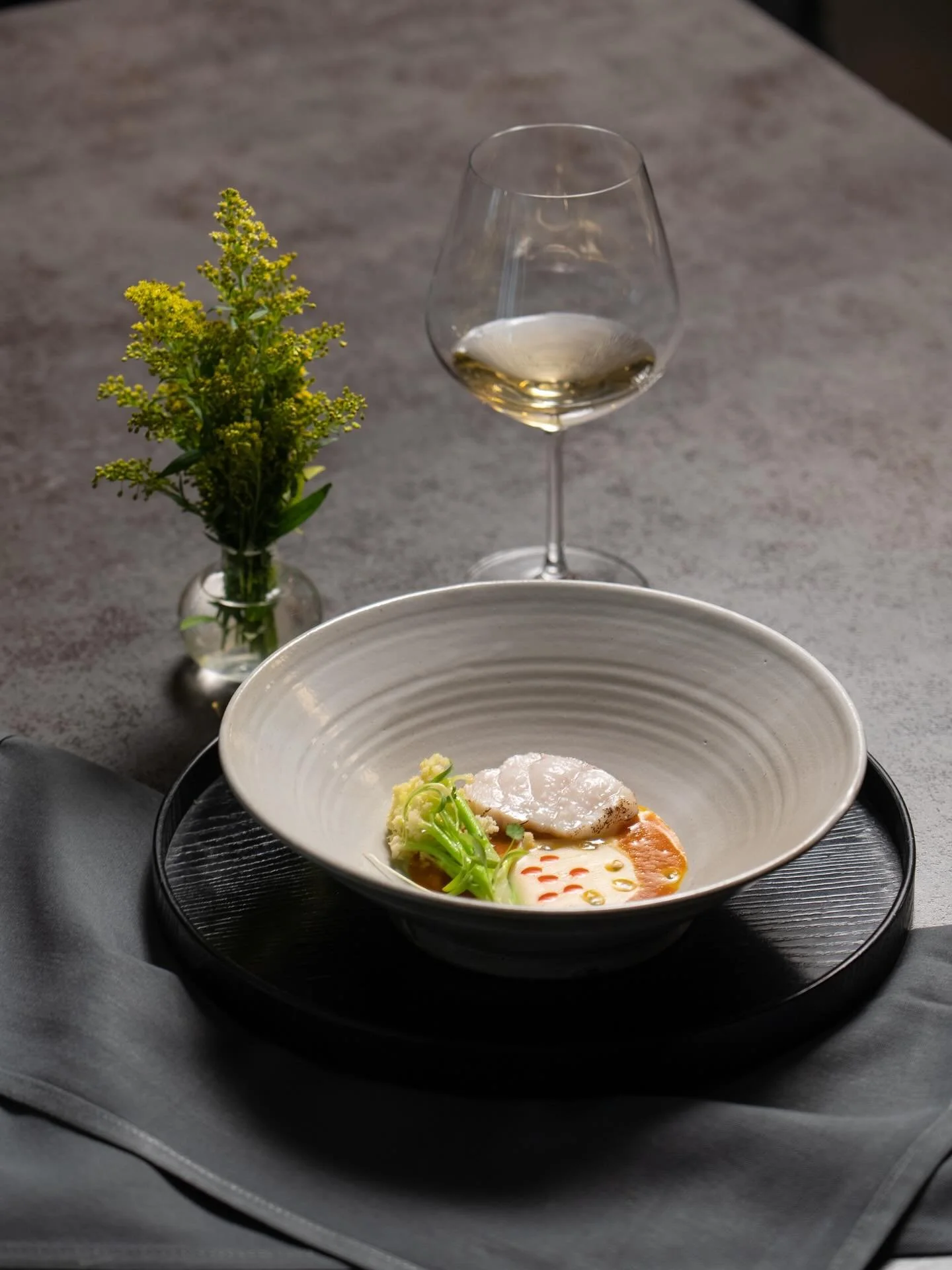 Monkfish

With massaman curry, a smooth bone marrow emulsion, and a burst of Passion fruit.

Paired with certified organic Malvasia from the limestone hills of Istria. It has notes of peach, pineapple, white flowers, and just enough wild texture to k