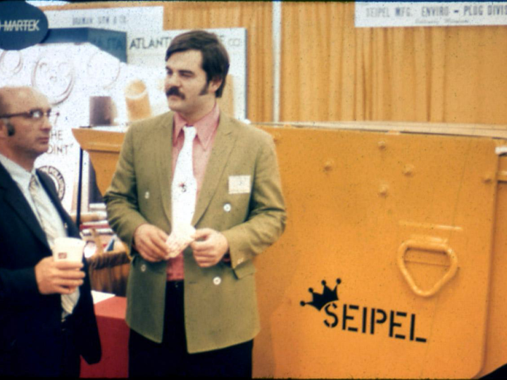 Vice President Rowe with a customer.