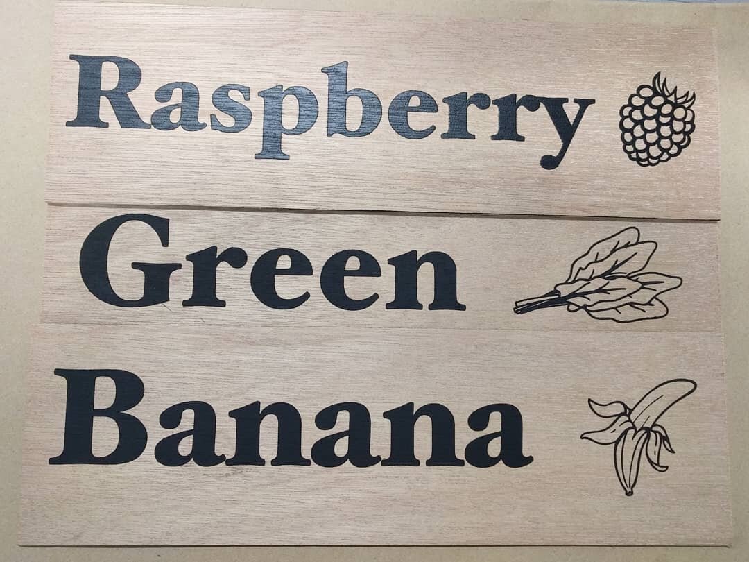 Black engraved and sprayed artwork on marine plywood. We made these signs for a new school canteen.