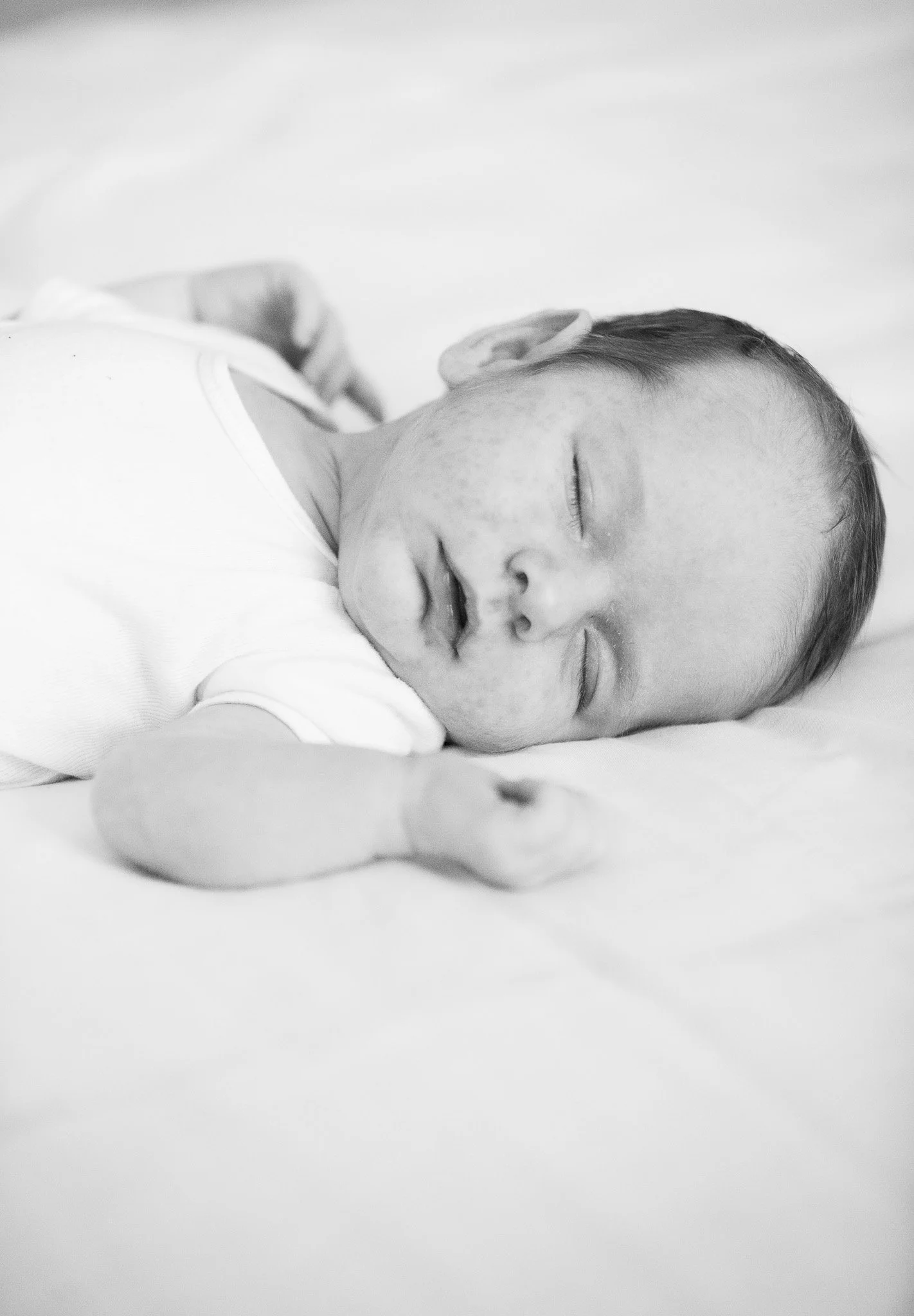 Snuggle Pix Photography | A newborn baby is photographed sleeping during a photo session at home | Noosa | Brisbane | Sunshine Coast.jpg