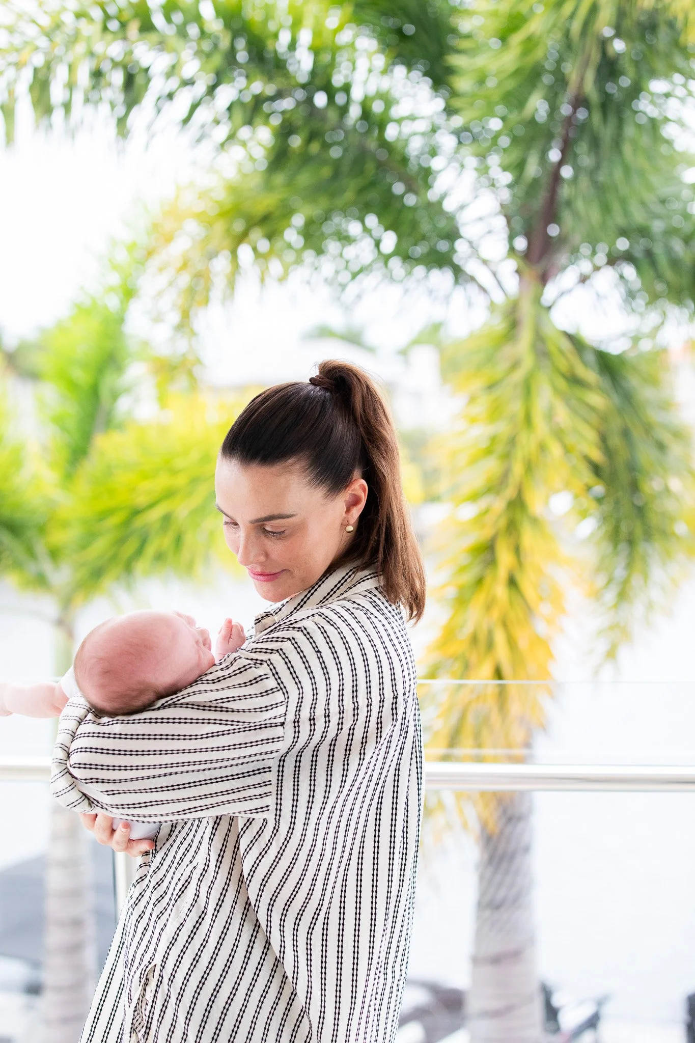 Snuggle Pix Family Photographer | Outdoor shot of Mum and newborn baby in Noosa | Noosa | Sunshine Coast | Brisbane.jpg