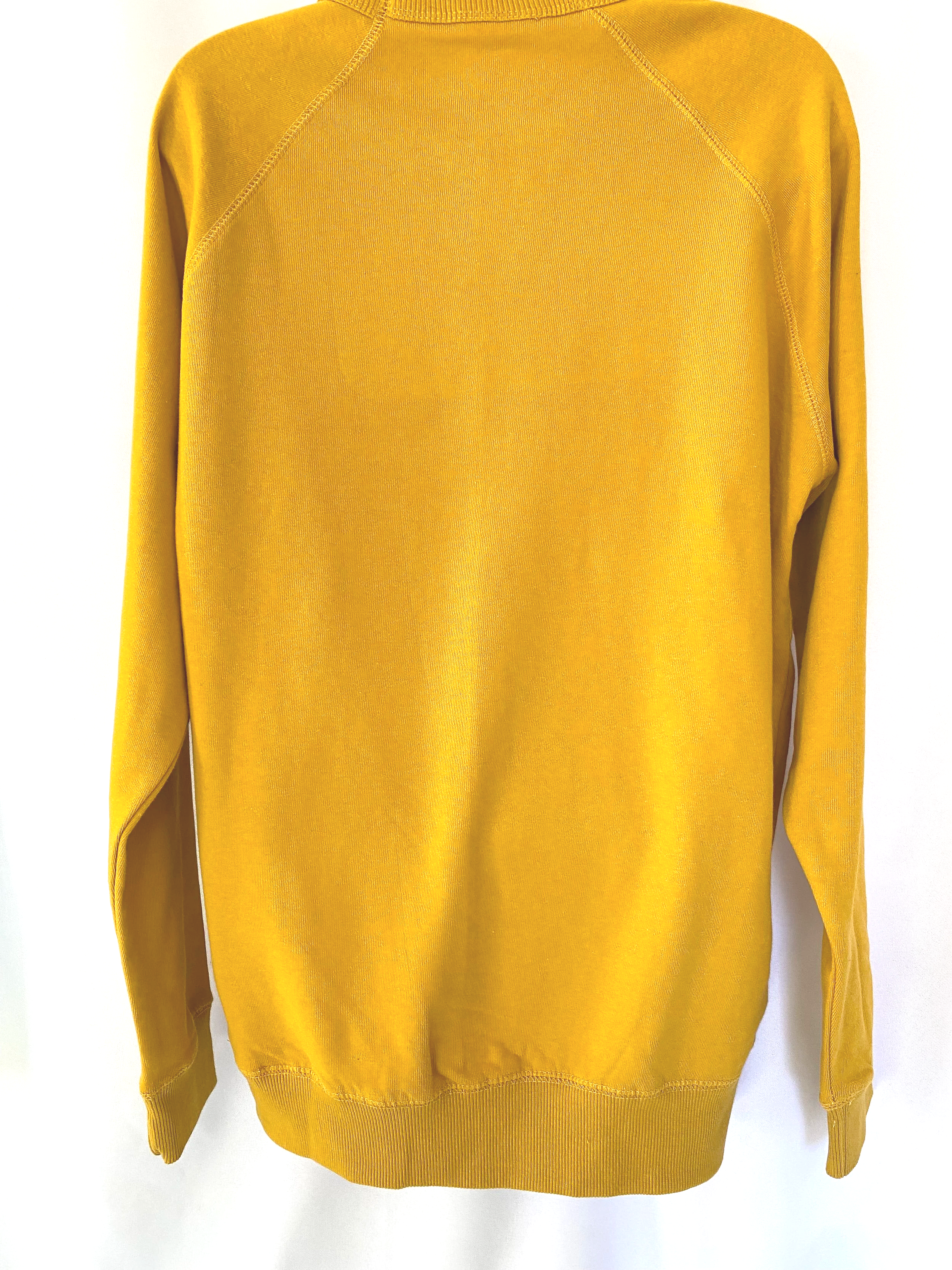 back of mustard crew neck sweatshirt