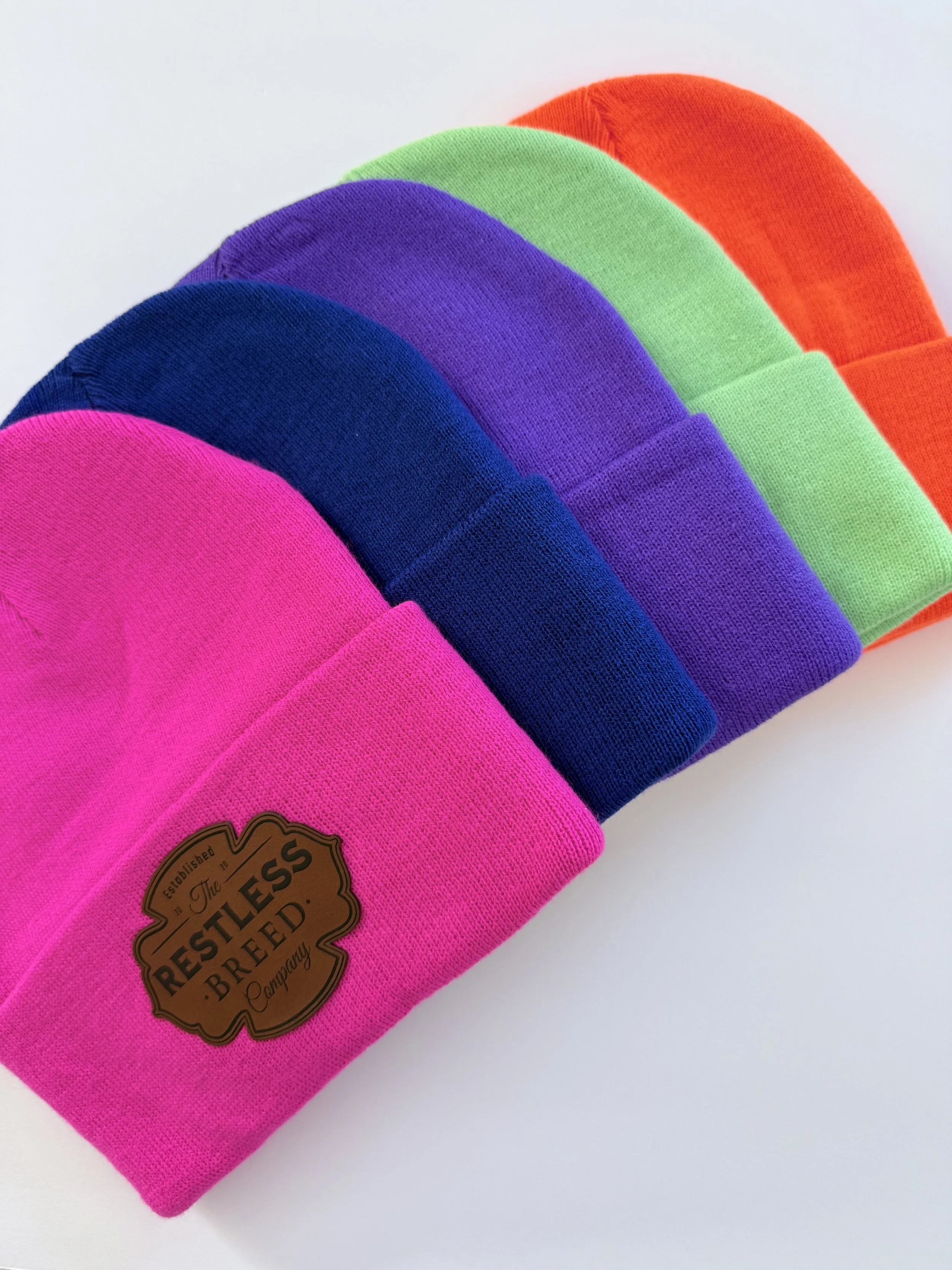 brite colored restless breed ski hats