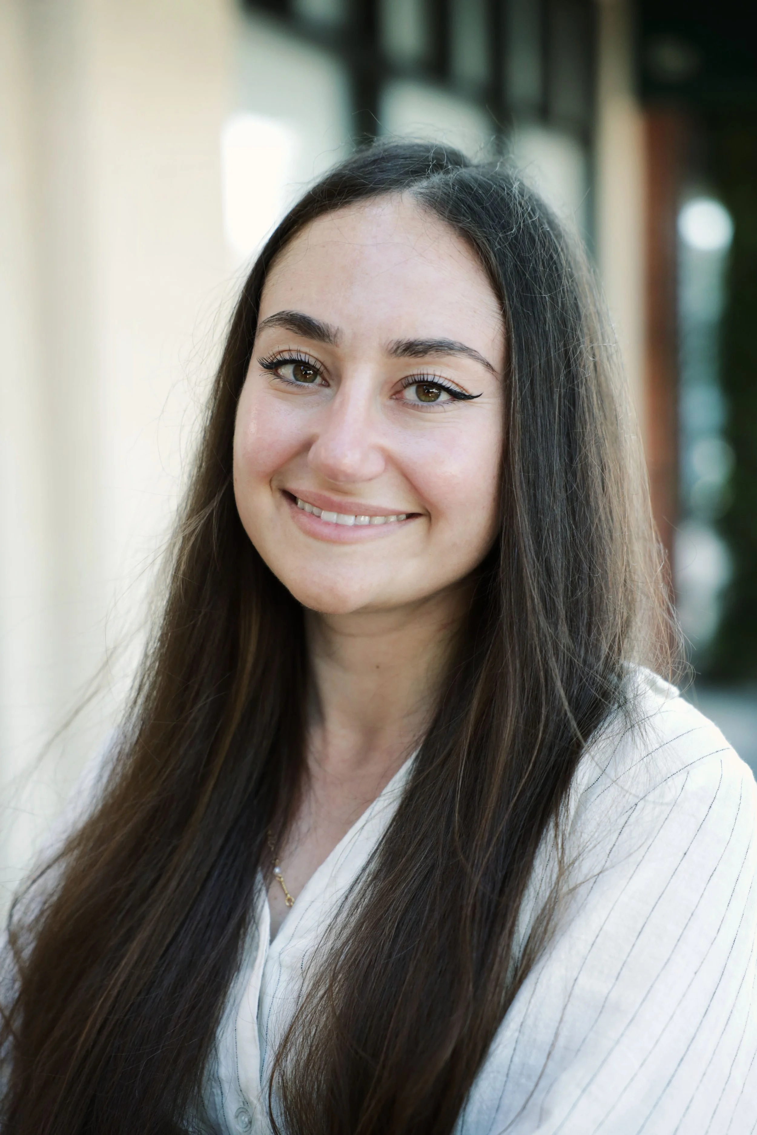 an image of Ashkhen Chamasanyan smiling at the camera