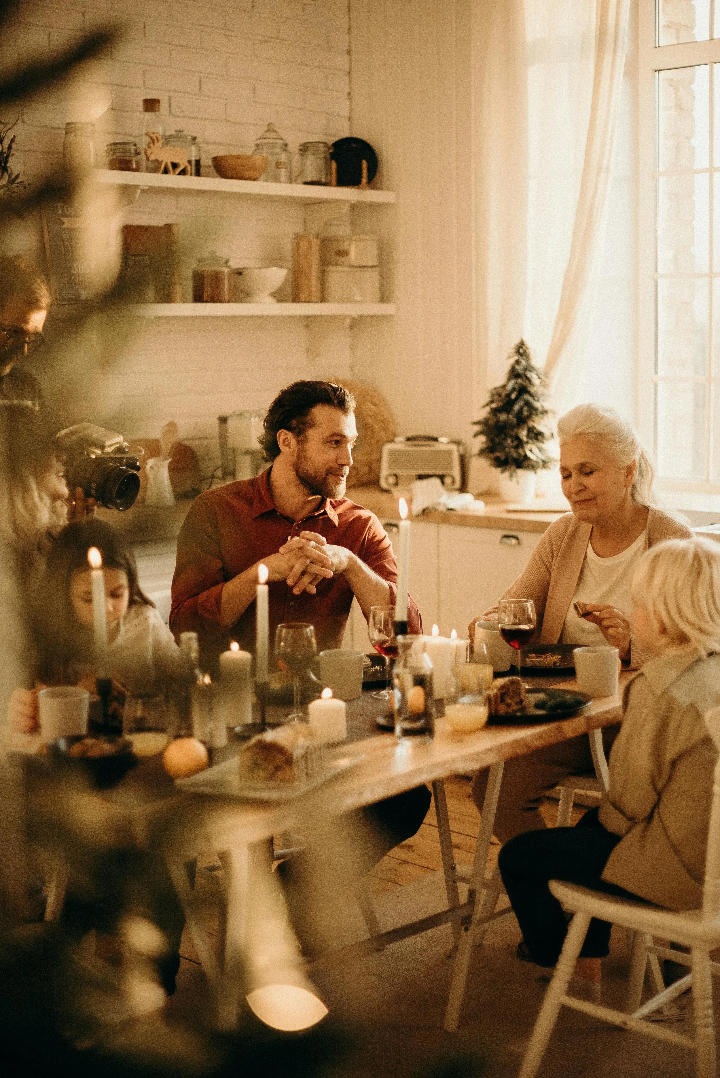 a family gathered at the table