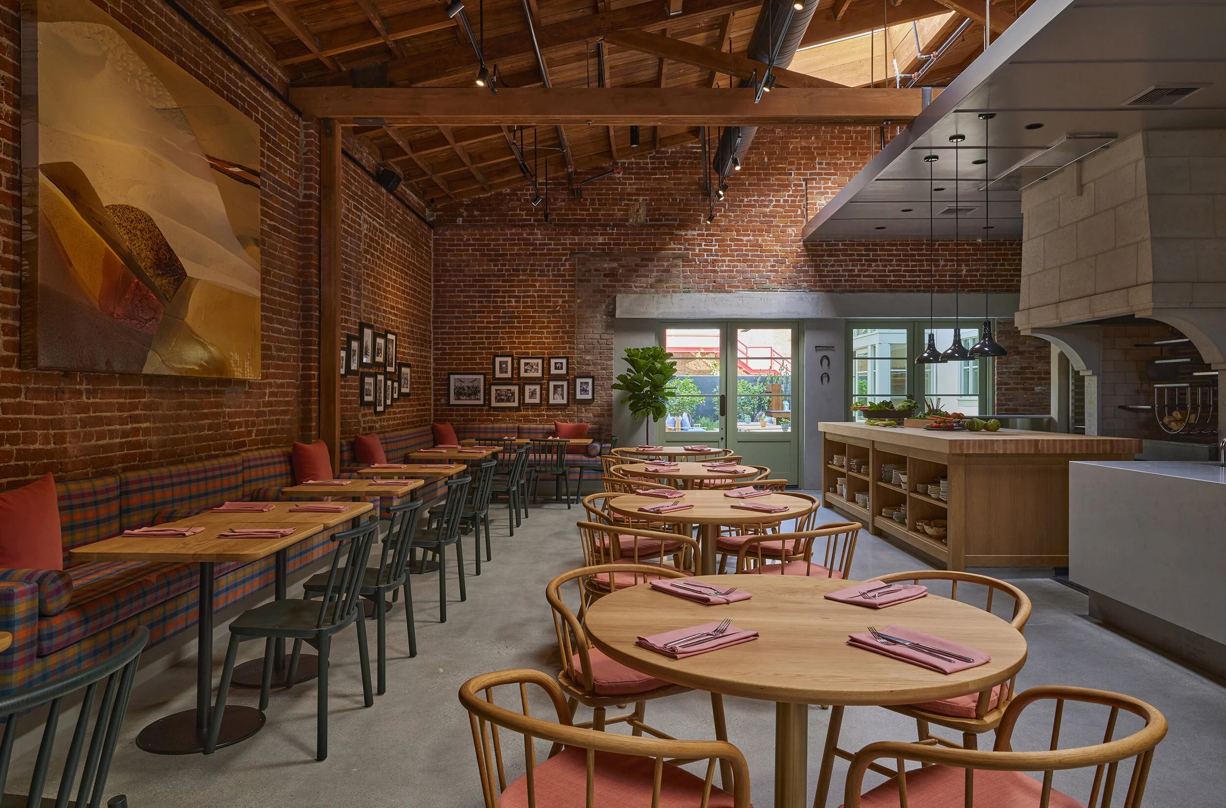 The warm dining room and hearth at Agnes in Pasadena