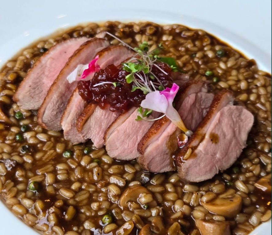 Sous vibe Duck breast crispy skin on Mochi pearl barley & foie gras risotto and spicy tomato jam