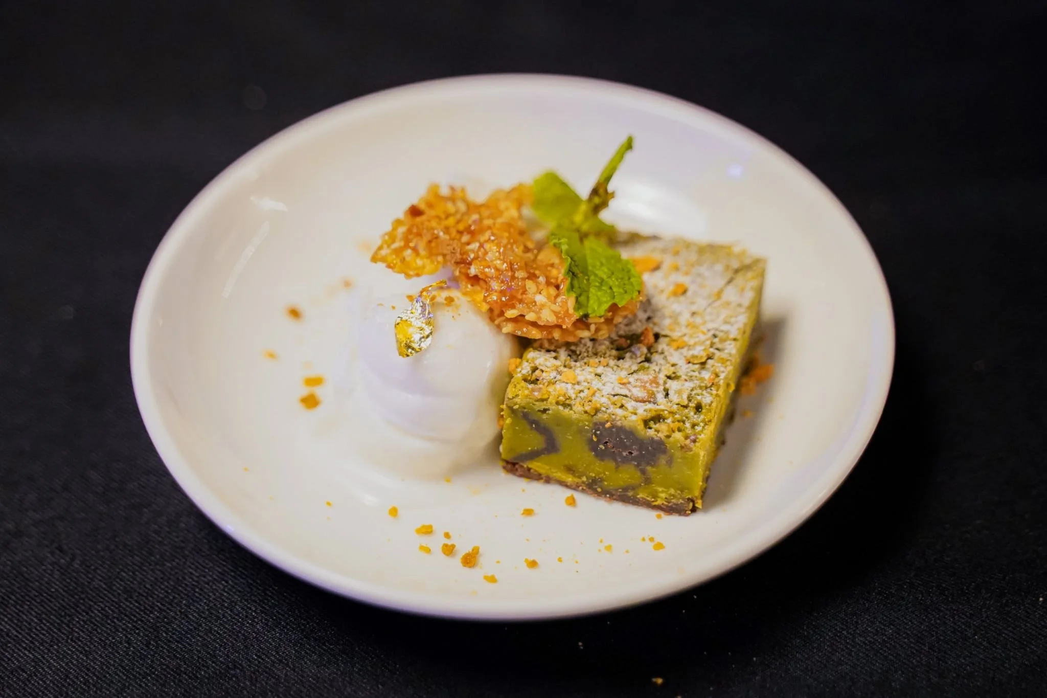 Homemade Matcha & Pistachio Brownies
Served with young coconut sorbet