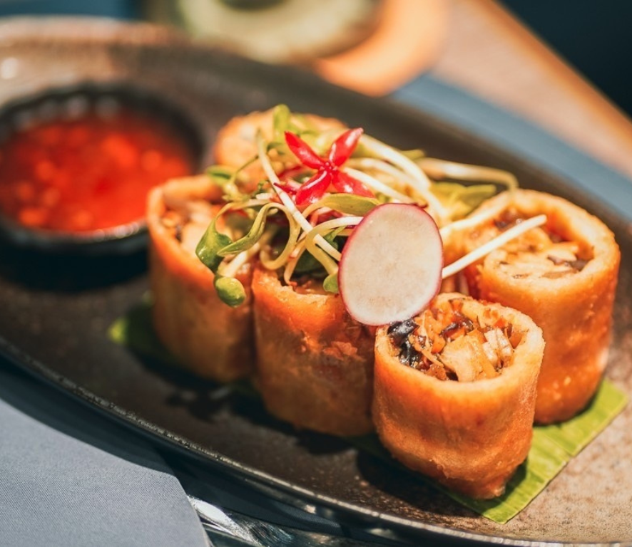 Brittany cod spring rolls sever with plum yuzu orange dip
