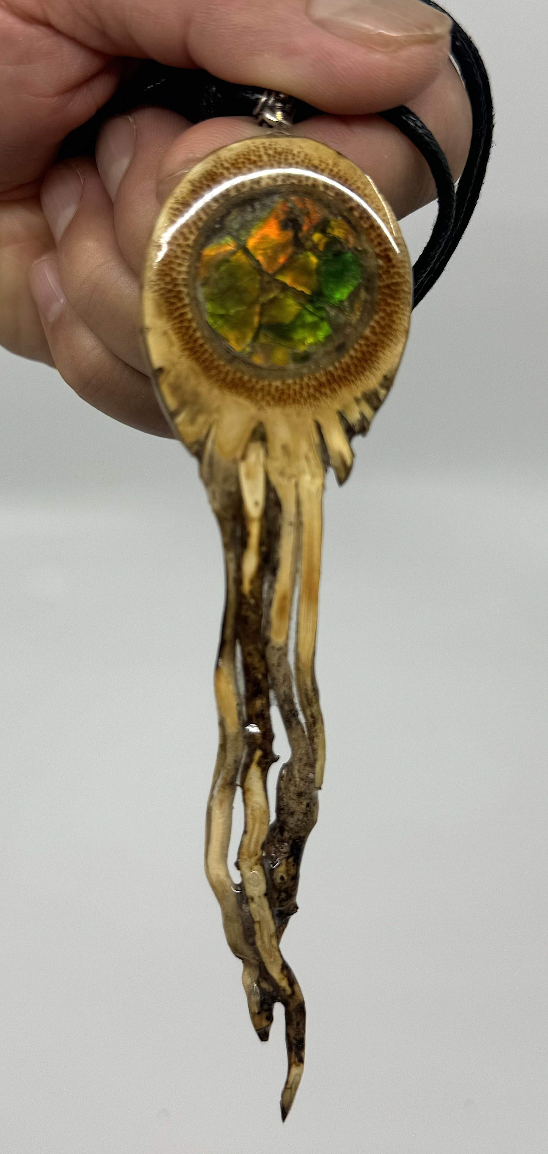 Sun Root Pendant (ammolite front, conch shell and gold pearl dust back)