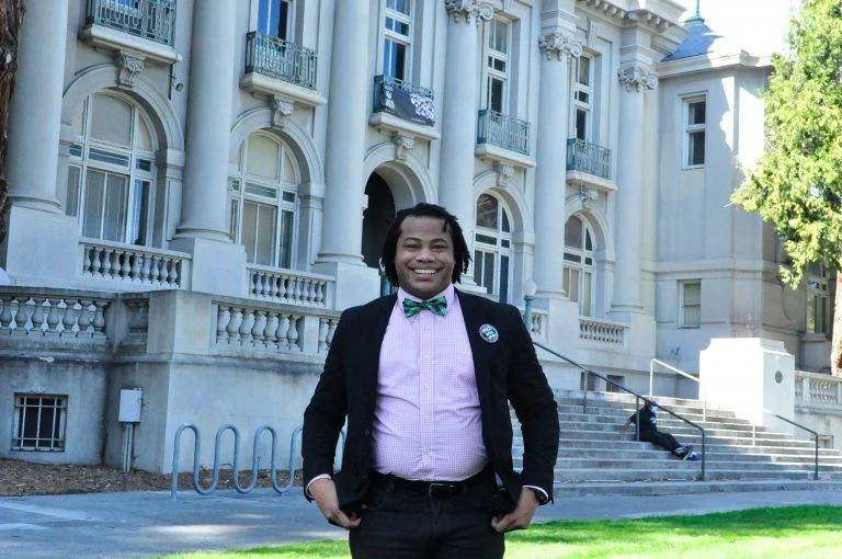 Aidan Hill, a mayoral candidate who graduated from UC Berkeley, stands outside of the Berkeley City Hall.