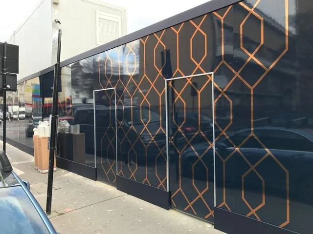 black and copper gloss finish hoarding
