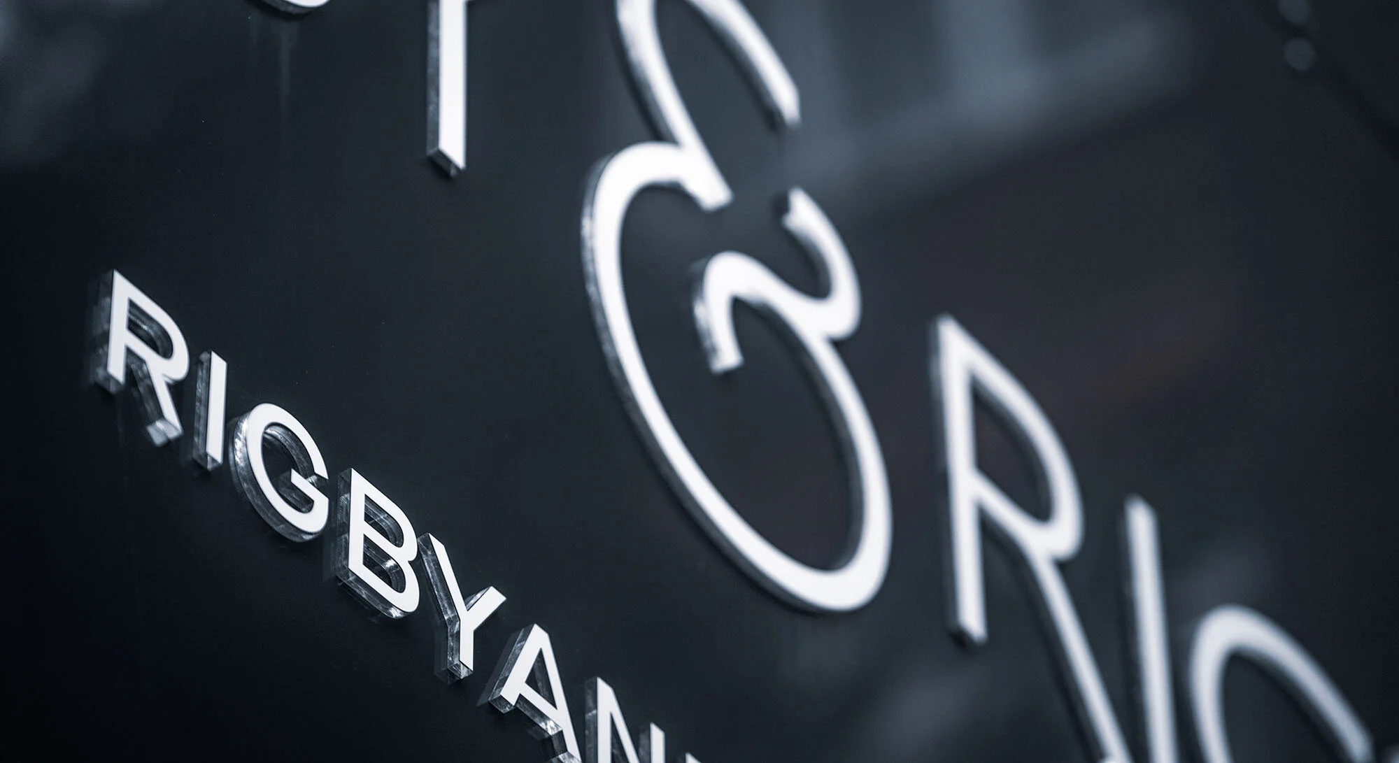 White signage on black background