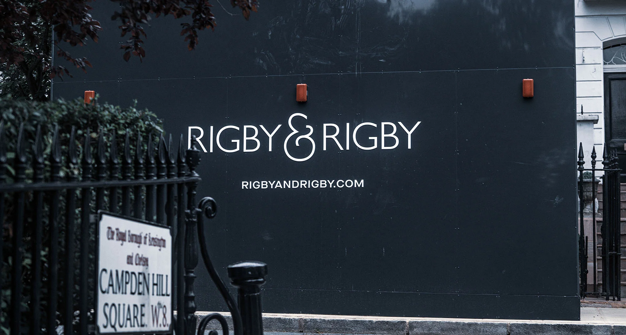 Black hoarding and signage