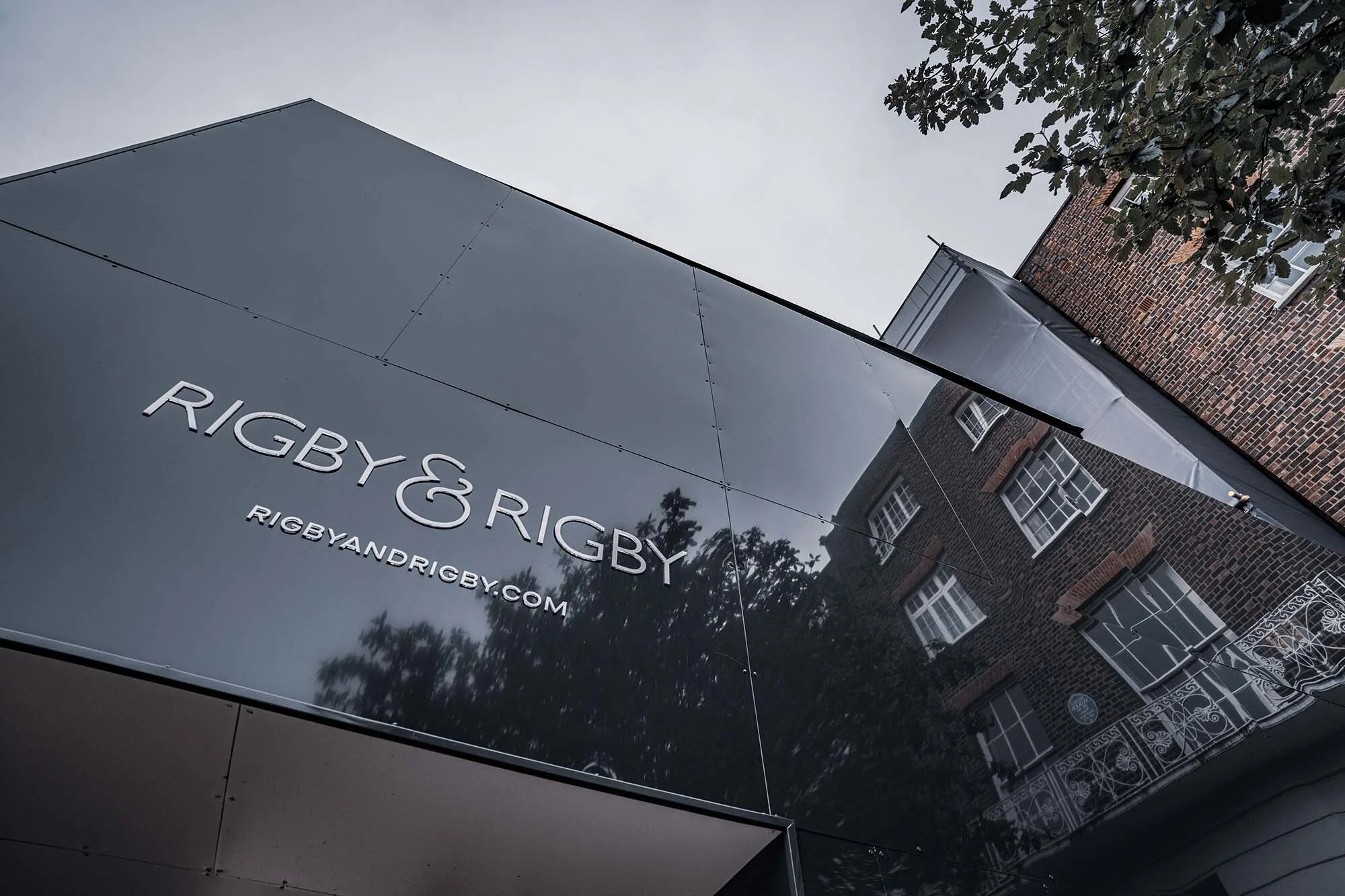 Black hoarding and signage