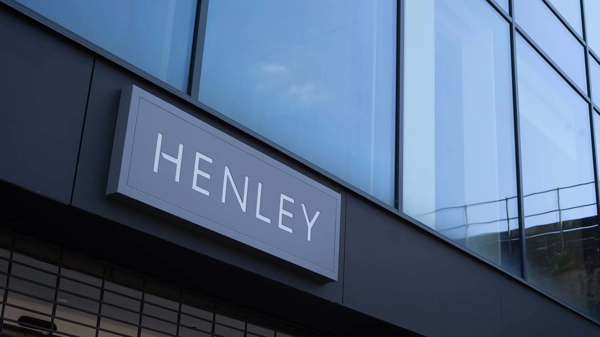 Grey and white henley sign