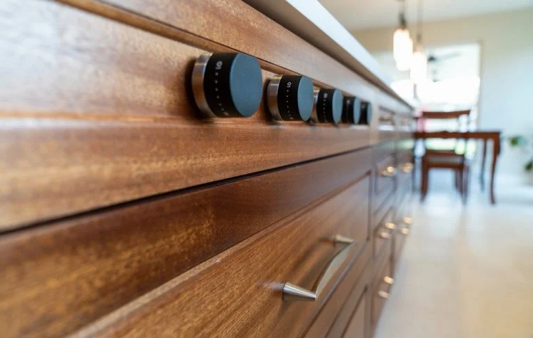 A cooktop integrated into your kitchen island creates a seamless experience and a strong design focal point, bringing a sense of everyday function and understated luxury. It pairs especially well with the surrounding wood tones.

#homerenovation #aus