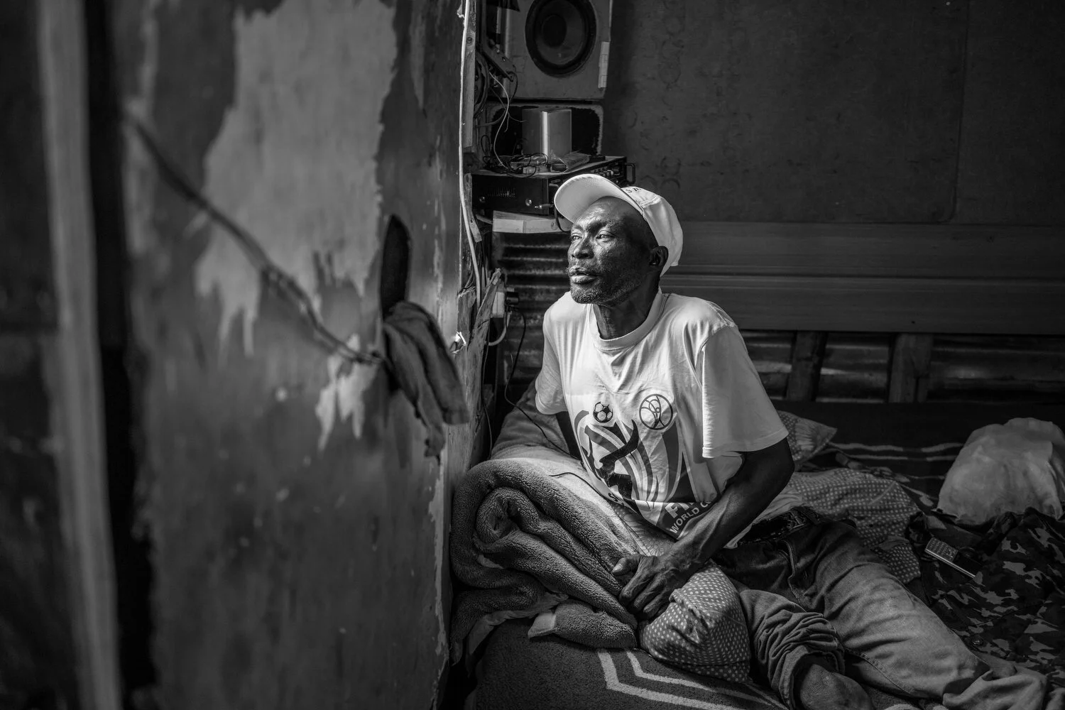  Khayelitsha, Cape Town, South Africa - 11/12/2018  Phindile Sambatha in his home in Khayelitsha. He was born before the introduction of Apartheid. When Sambatha joined resistance to the regime he was persecuted because of it. During an attempt on hi