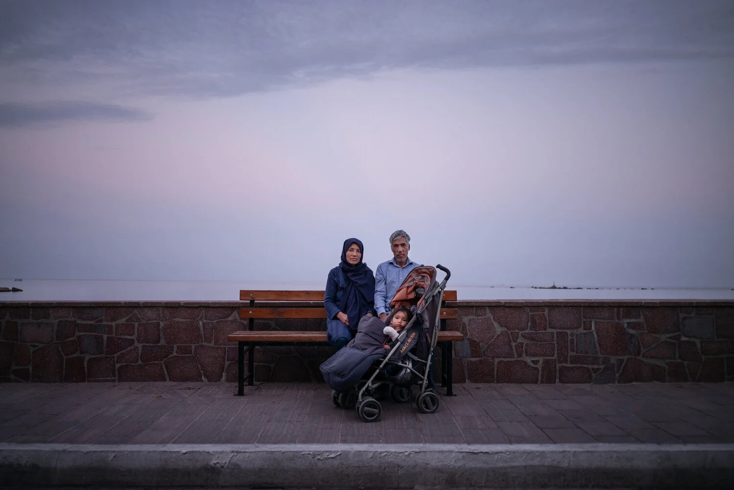  Mytilini, Lesbos - 20/11/2019  Sayed and Basiraa Kabir (from Herat, Afghanistan) with their daughter on a bench in Mytilini, about 10 kilometers from Moria Camp. 