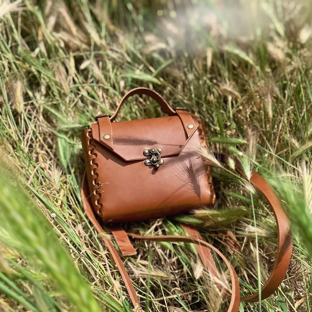 Petit sac à dos en cuir marron — Maison Rottier