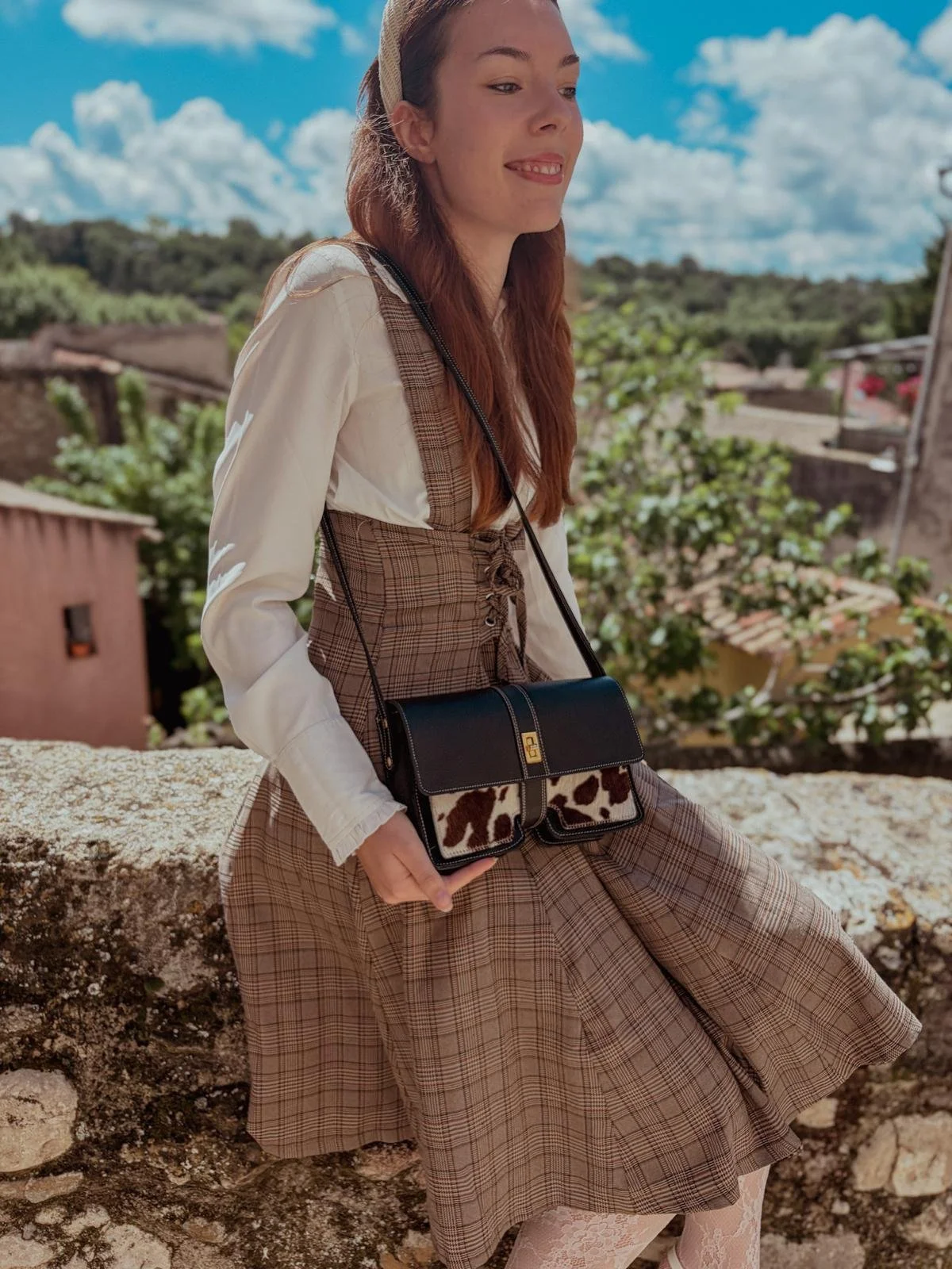 Sac en cuir noir et motif vachette