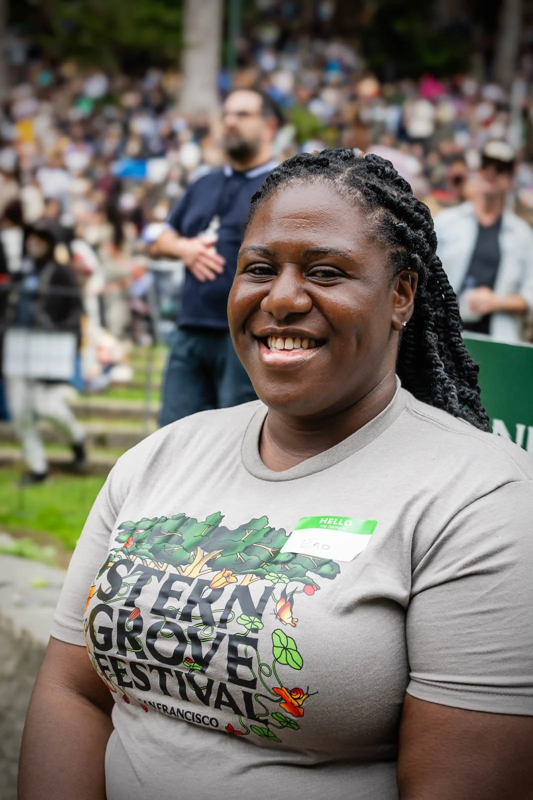 woman volunteering for stern grove sitting and smiling