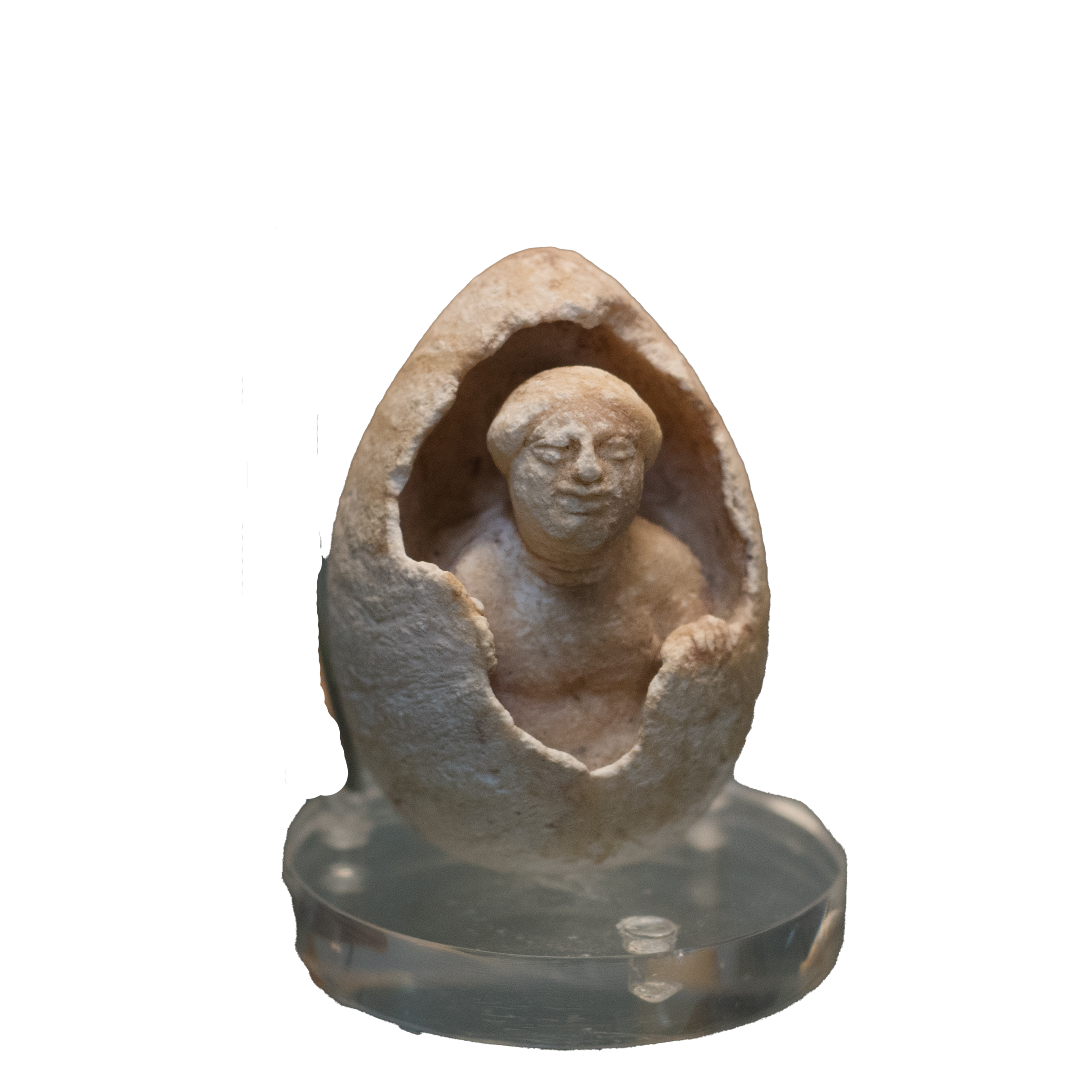 Limestone egg with emerging woman (Helen?)