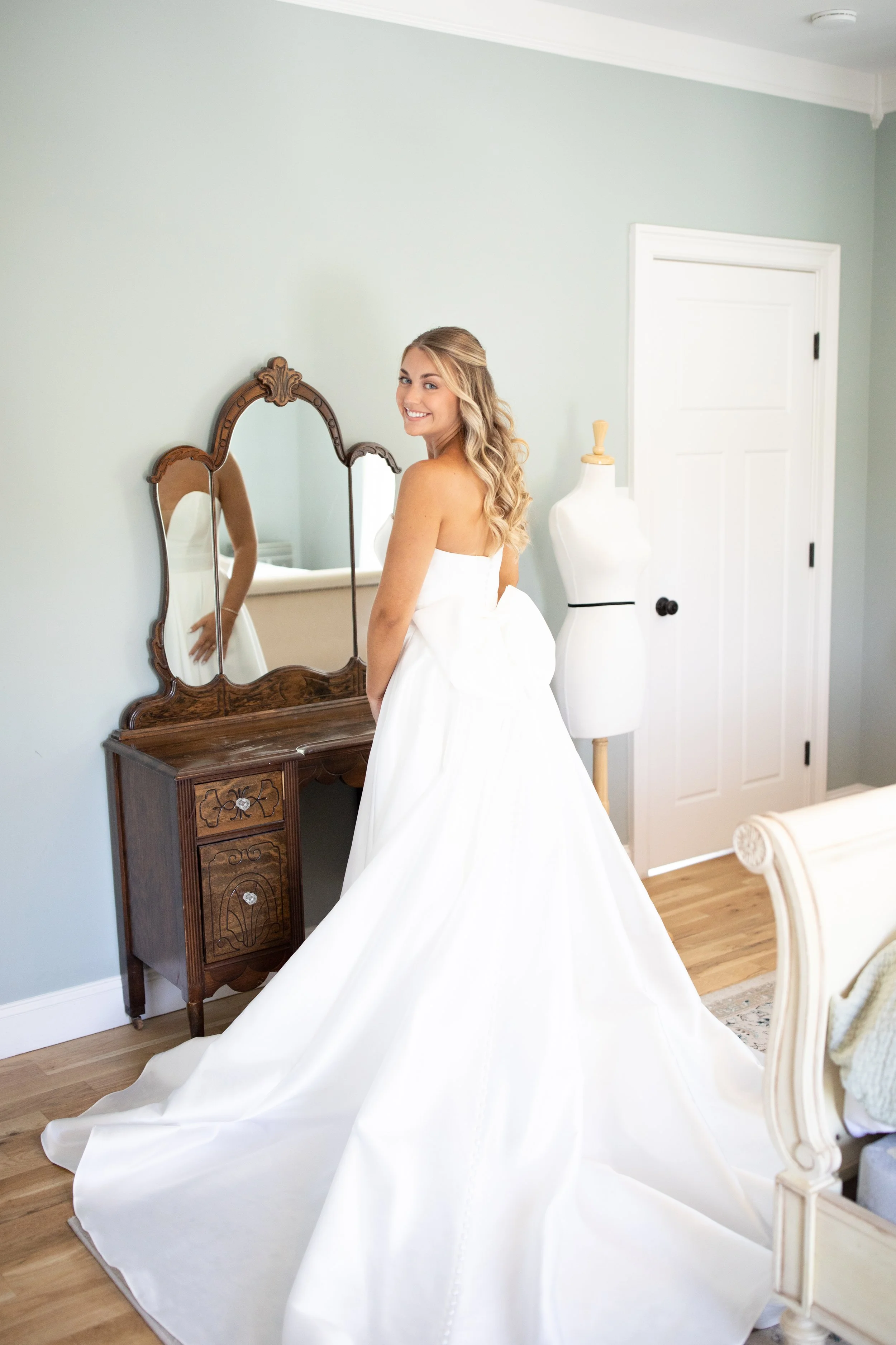 Luxurious Hollywood wave half-back bridal style with high-shine finish, curated for an upscale ballroom wedding at the Bradford Raleigh, NC.