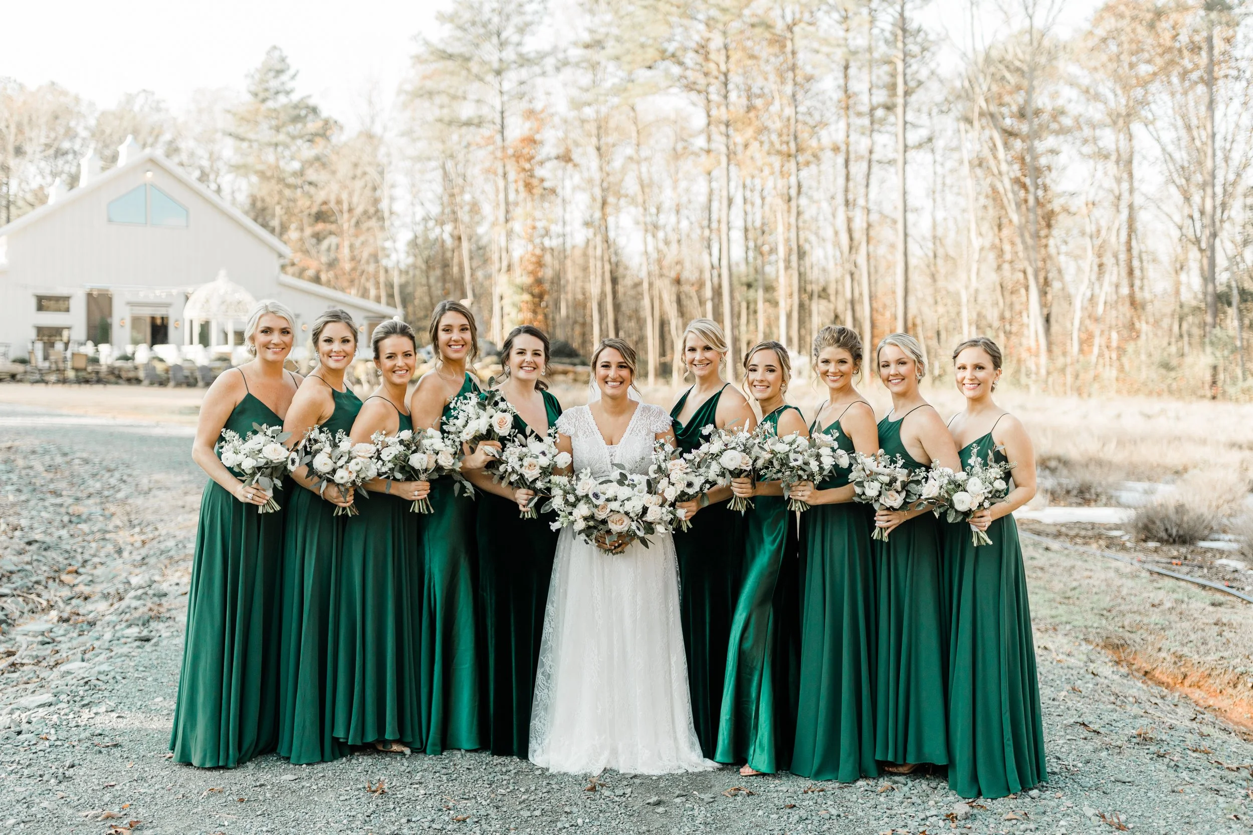 Luxury bridal party hair and makeup for a wedding in Raleigh, NC featuring elegant updos and soft glam for bridesmaids.