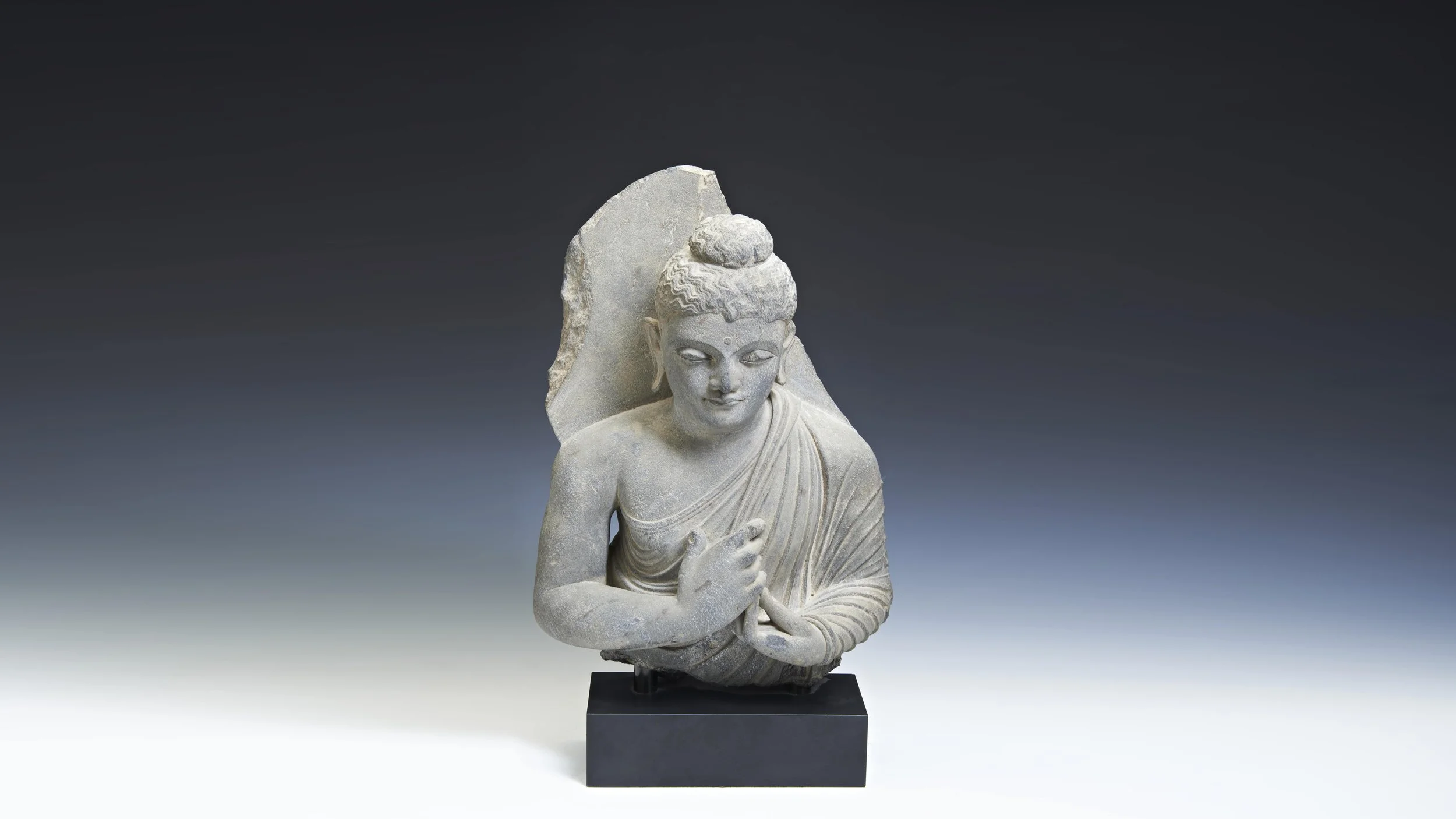 MONDAY 10 NOVEMBER AT 9:30AM
FINE ASIAN ART
A GREY SCHIST BUST OF BUDDHA, GANDHARA, 2ND/3RD CENTURY
PROVENANCE: From the Collection of J. W. Allen Esquire
ESTIMATE: £3,000 - £5,000