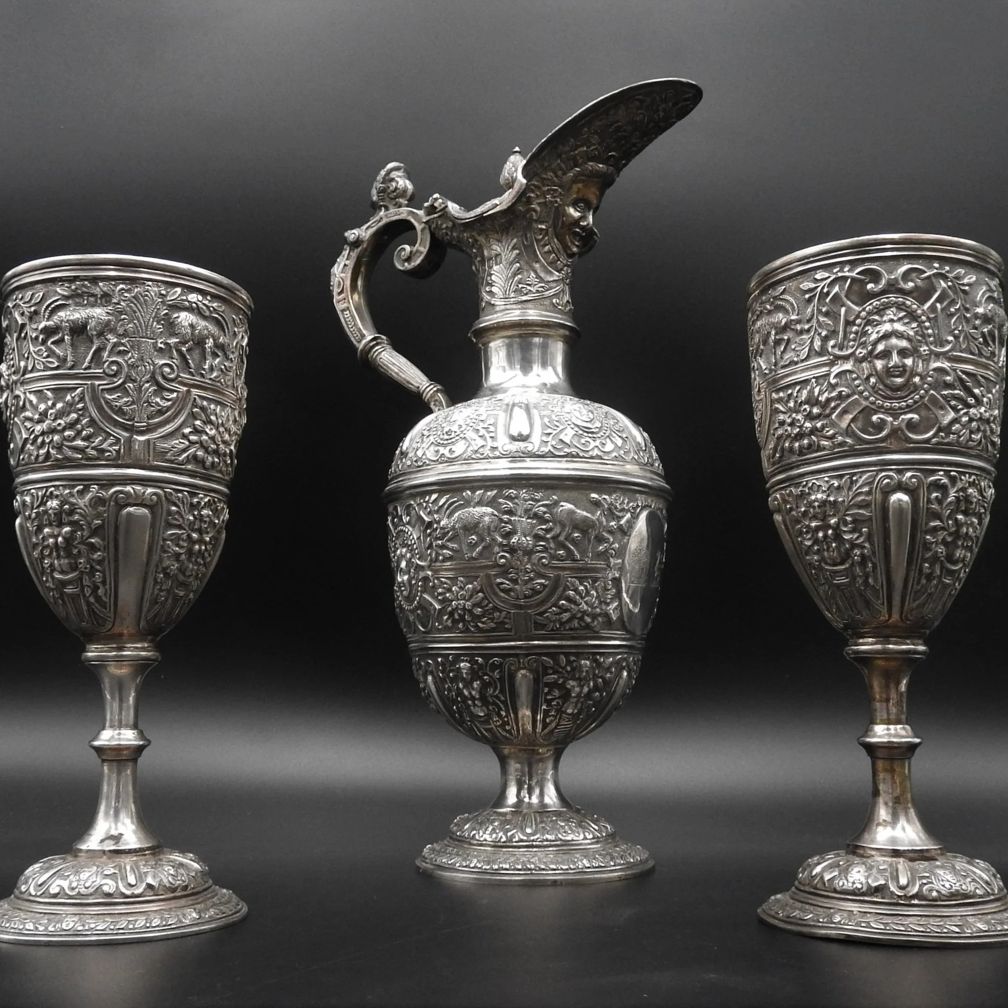 silver claret jug and goblets