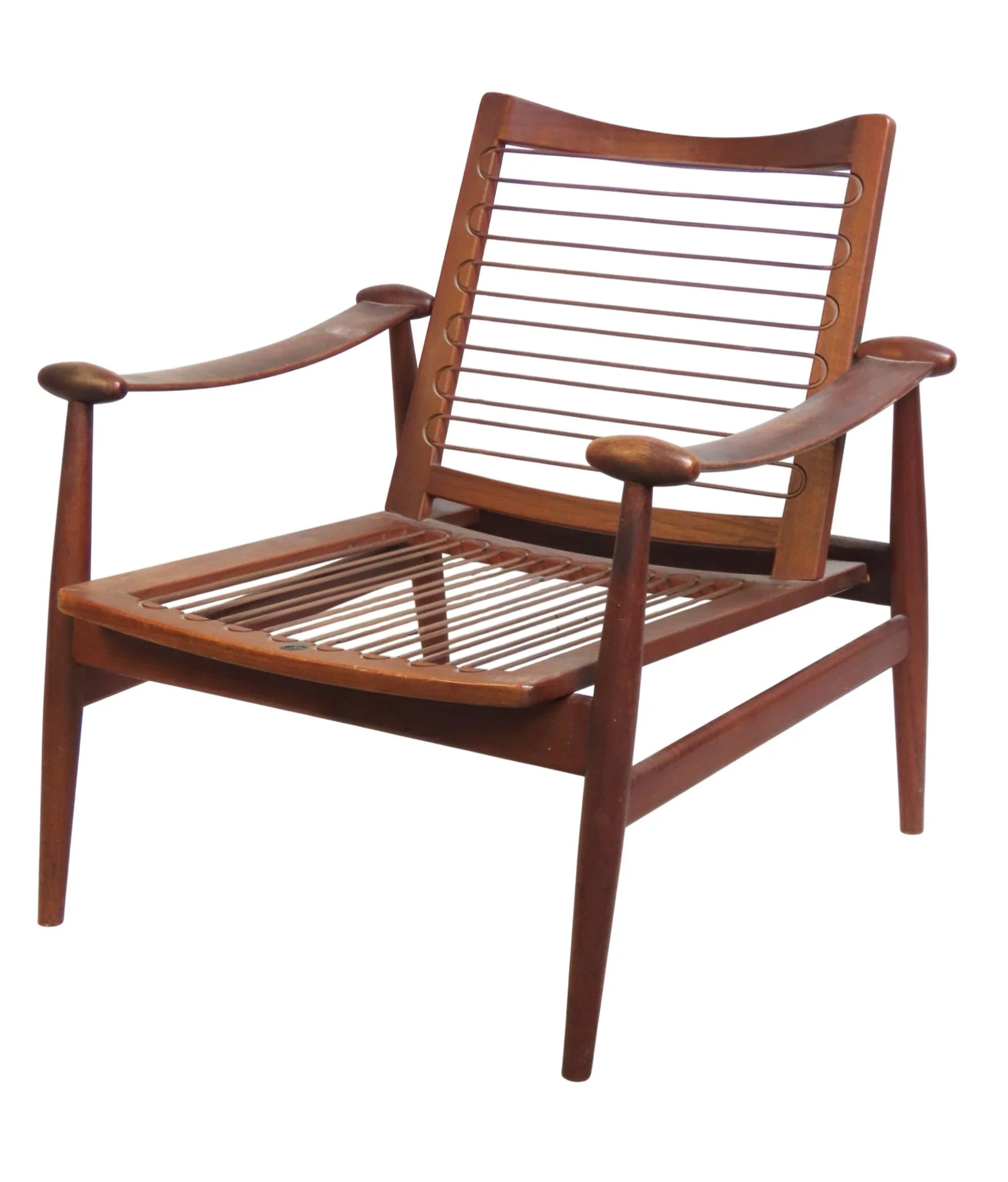 A 'SPADE' ARMCHAIR BY FINN JUHL FOR  FRANCE & DAVERKOSEN the teak frame inset with a manufacturer's button label 73 x 74 x 70 cm  Provenance: From the collection of Lucy Miranda Sipe; Artist, botanist, collector.