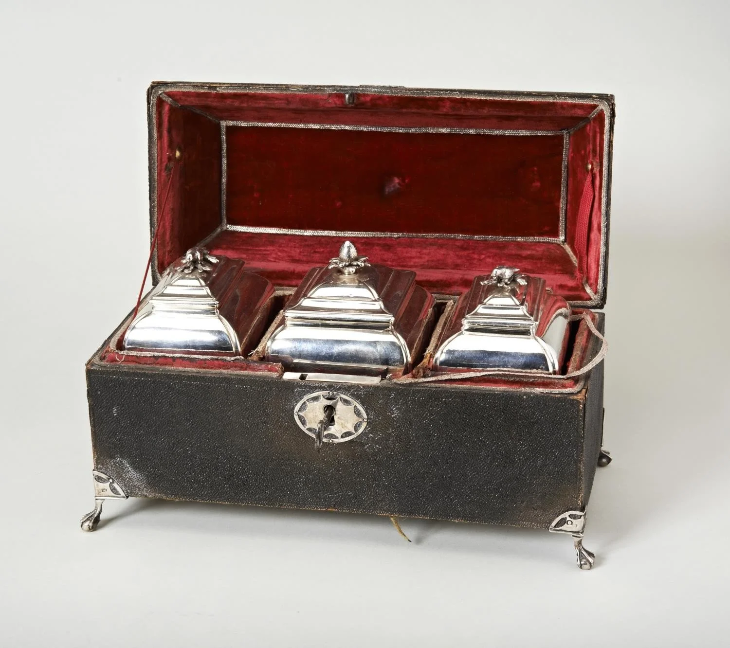 silver tea caddies and sugar box