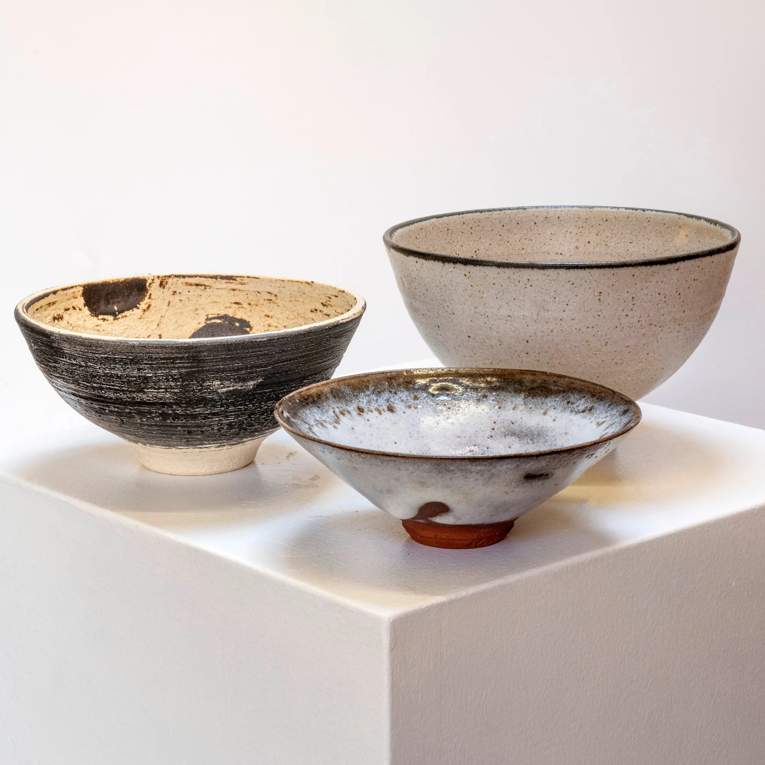 251015-autumn-interiors-the-michael-mason-trio-of-studio-pottery-bowls-milky-glaze.jpg